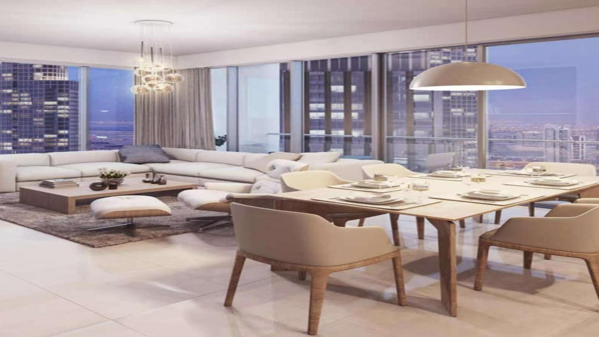 Luxurious bedroom with city skyline view in Downtown Dubai's Forte apartment