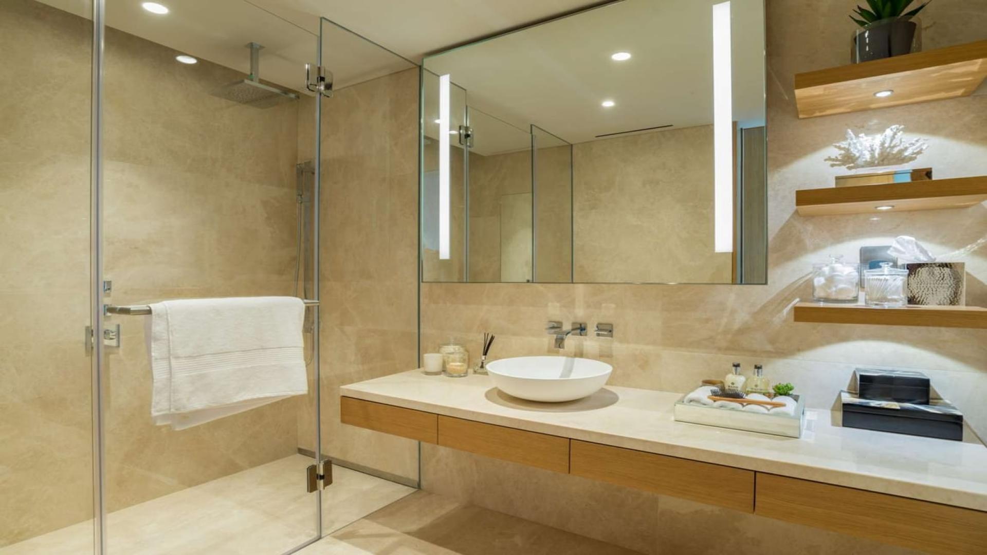 Luxurious Palm Jumeirah apartment with modern kitchen and elegant living area, sea views