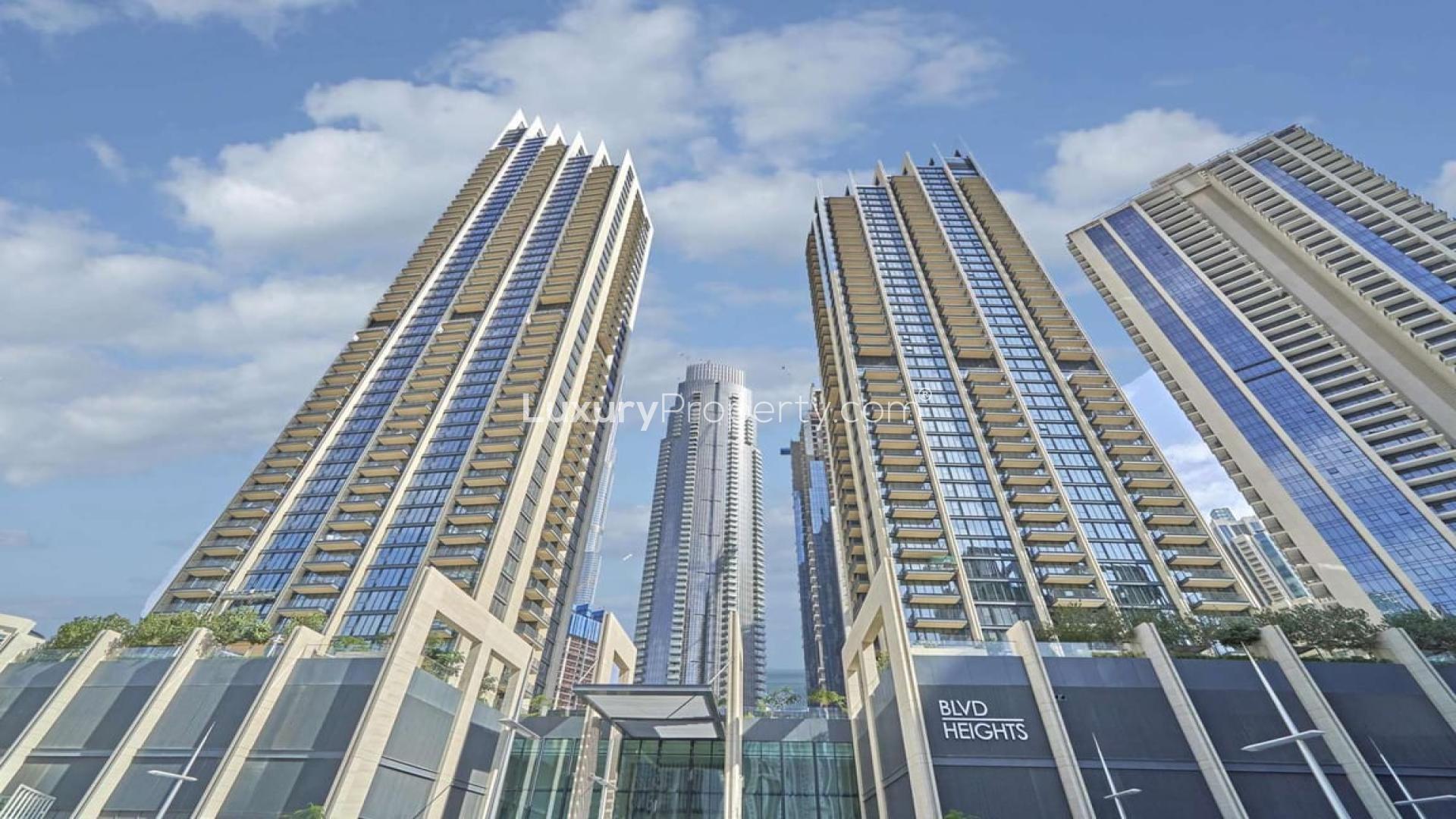 "BLVD Heights towers in Downtown Dubai, modern architecture for luxury apartment living.",Exterior view of BLVD Heights towers in Downtown Dubai, featuring modern architecture