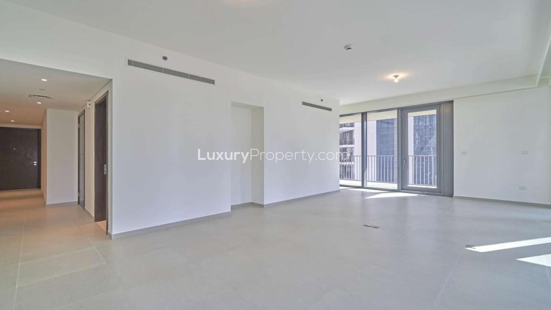 Outdoor pool with city skyline view at Boulevard Heights, Downtown Dubai apartment