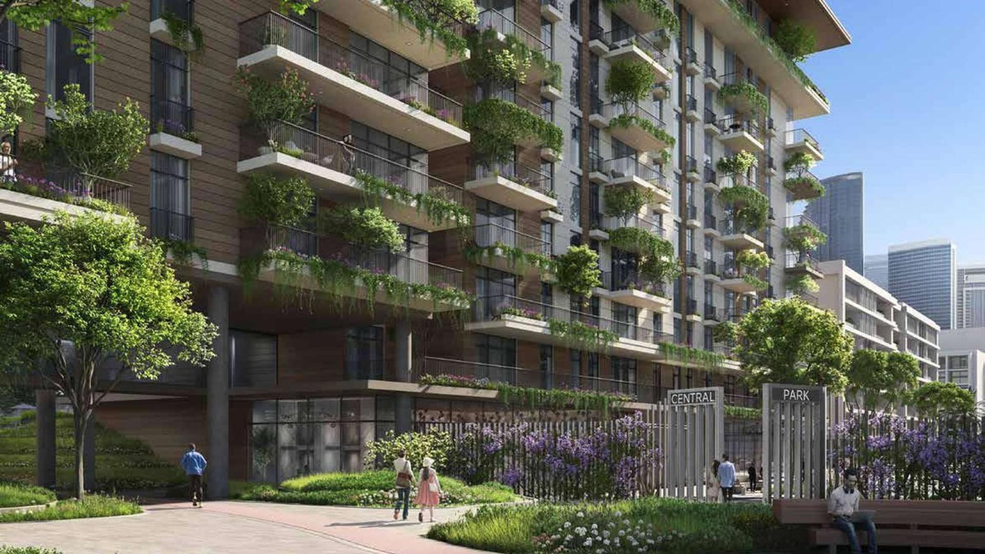 Stylish open-plan living room and kitchen in Central Park 1-bedroom apartment for sale