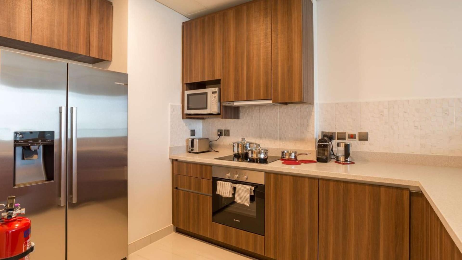 Luxurious apartment living room with stunning Palm Jumeirah views in Dubai Media City