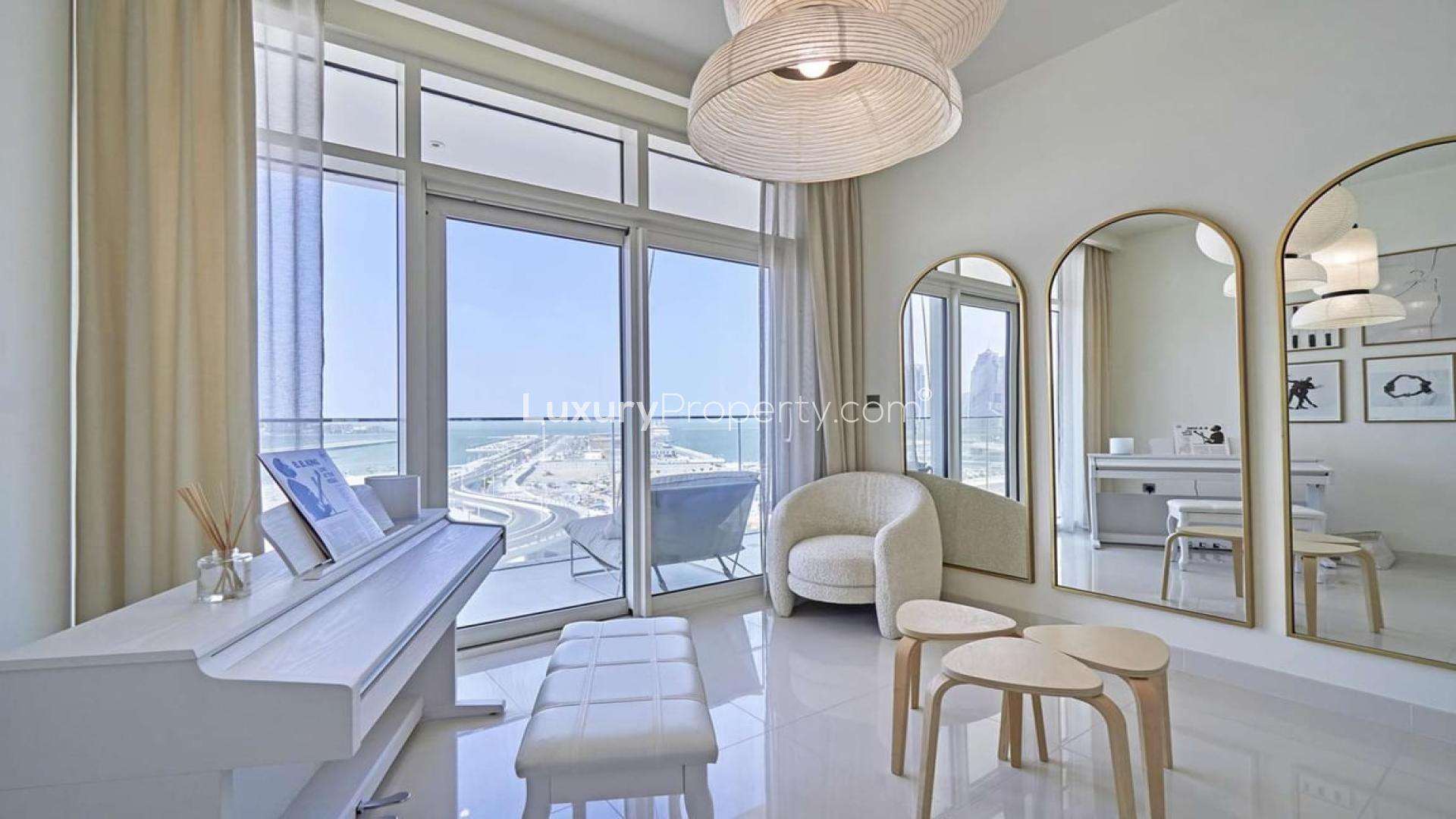 Modern kitchen and living area in chic waterfront apartment, Emaar Beachfront, Dubai Harbour
