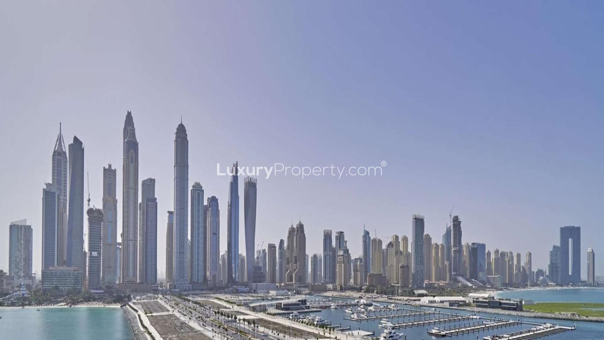 Modern living room with beachfront view in Emaar Beachfront apartment, Dubai Harbour