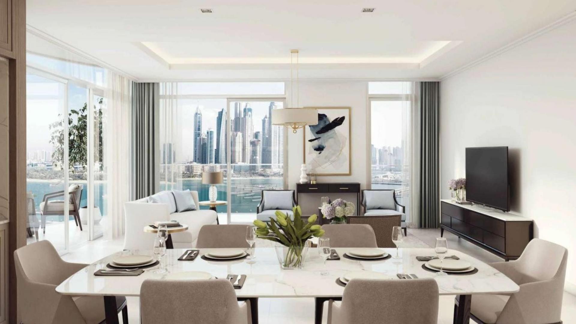 Infinity pool with Dubai skyline view at Emaar Beachfront apartment, Dubai Harbour