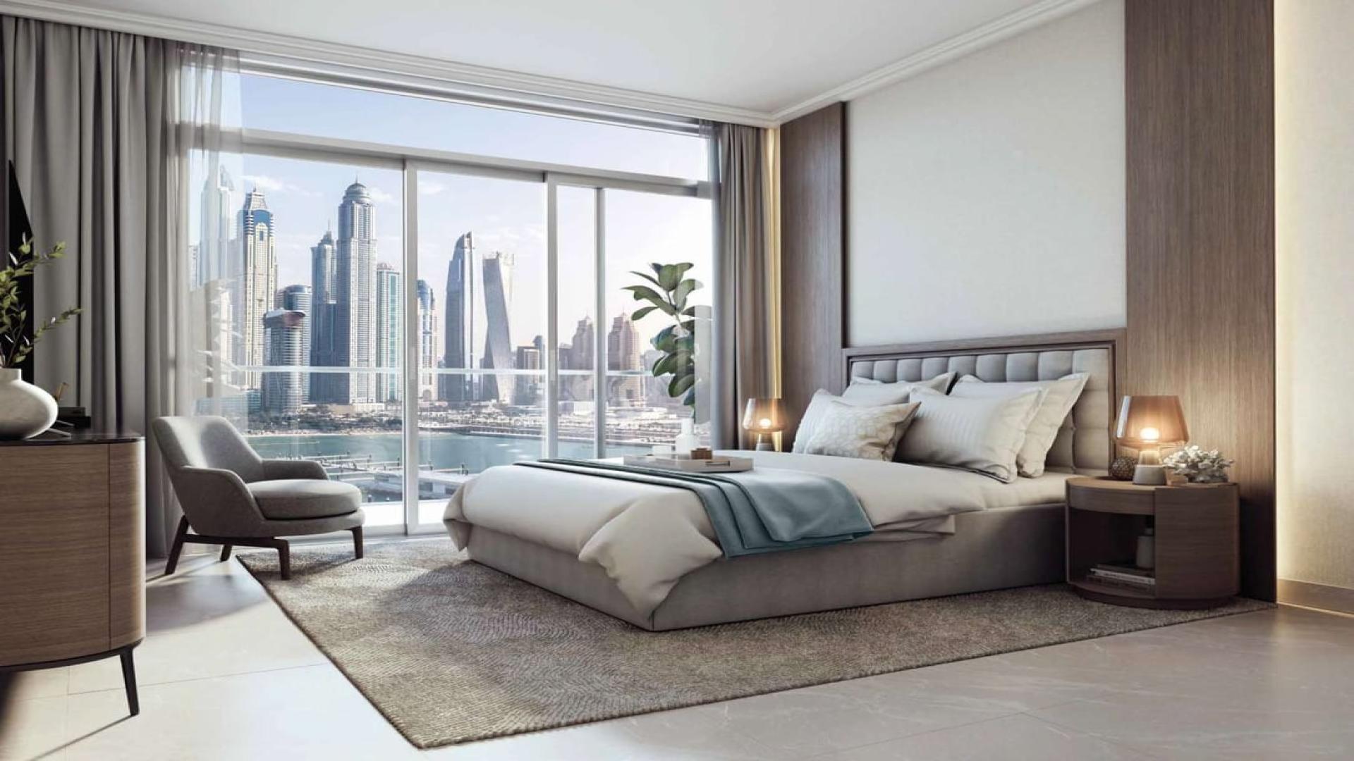 Luxurious bedroom with marina skyline view in Emaar Beachfront apartment, Dubai Harbour