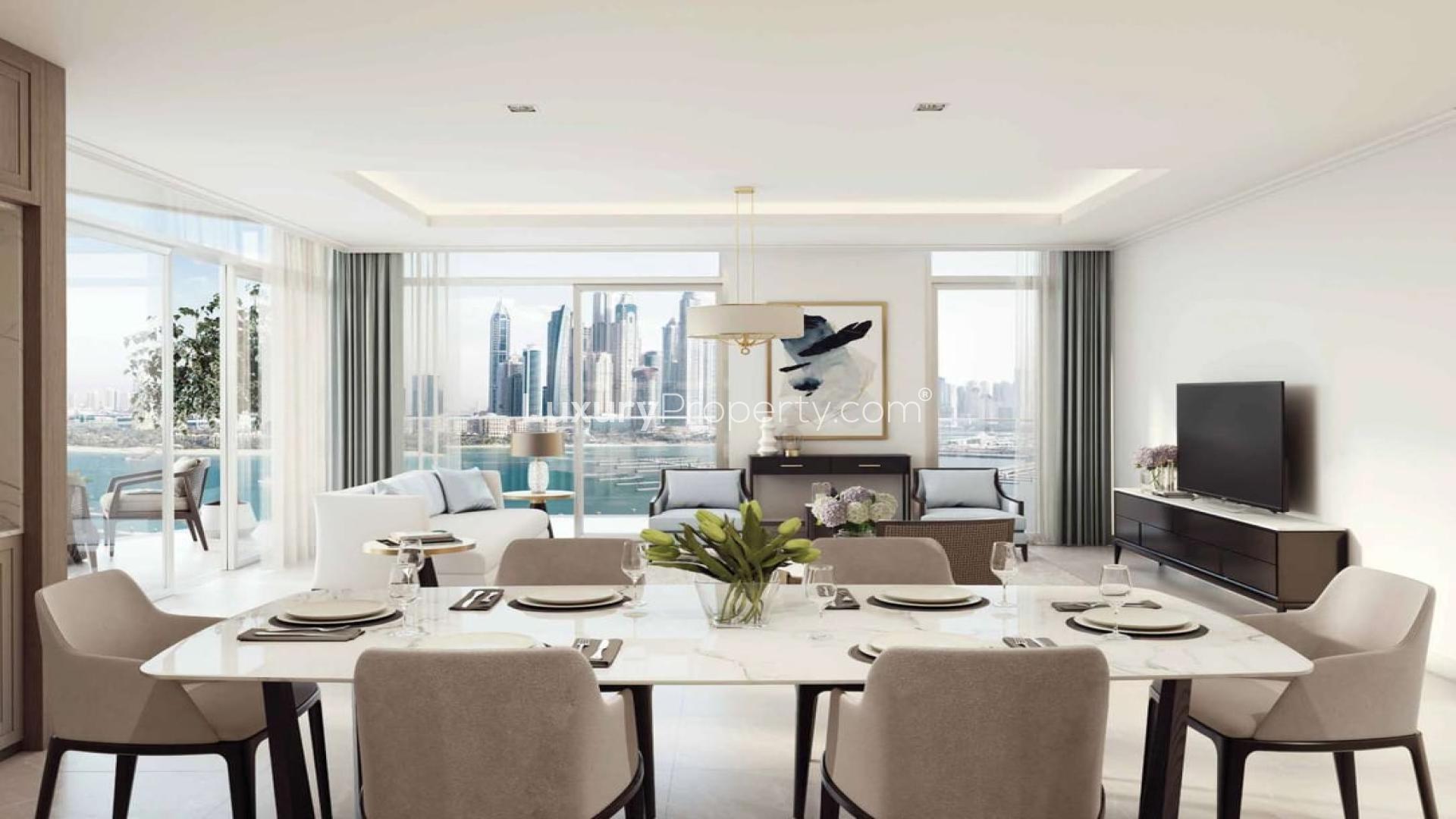 High-floor Emaar Beachfront apartment view, overlooking Palm Jumeirah and Dubai Harbour skyline