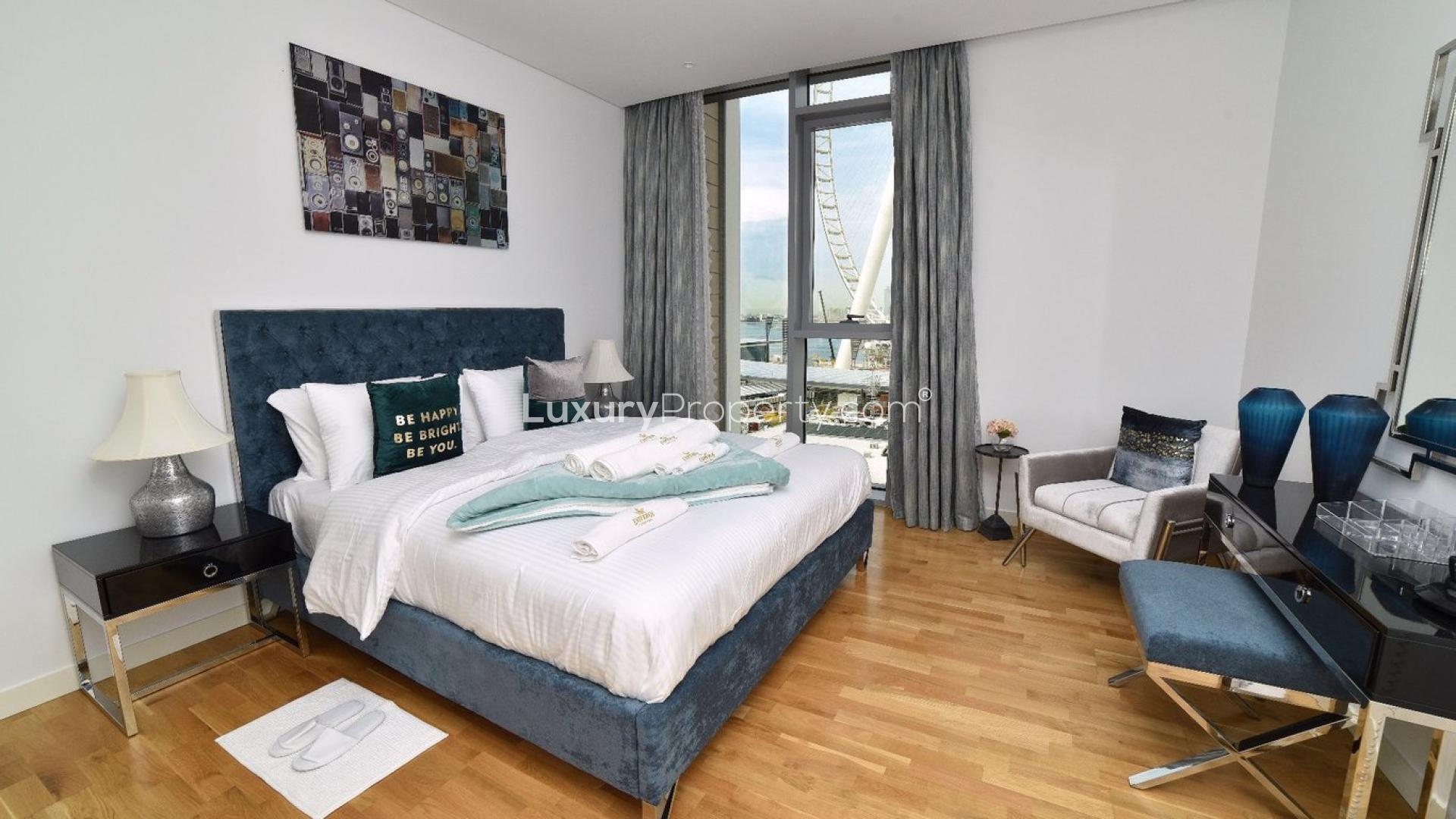 Renovated Bluewaters Island apartment living room with sea views and modern decor