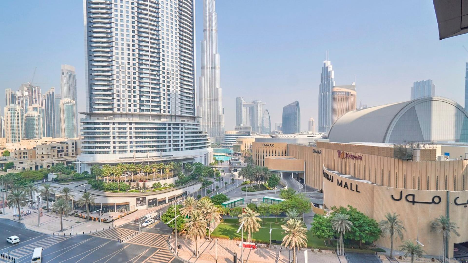 Bright, spacious living room with city views in Boulevard Point, Downtown Dubai apartment