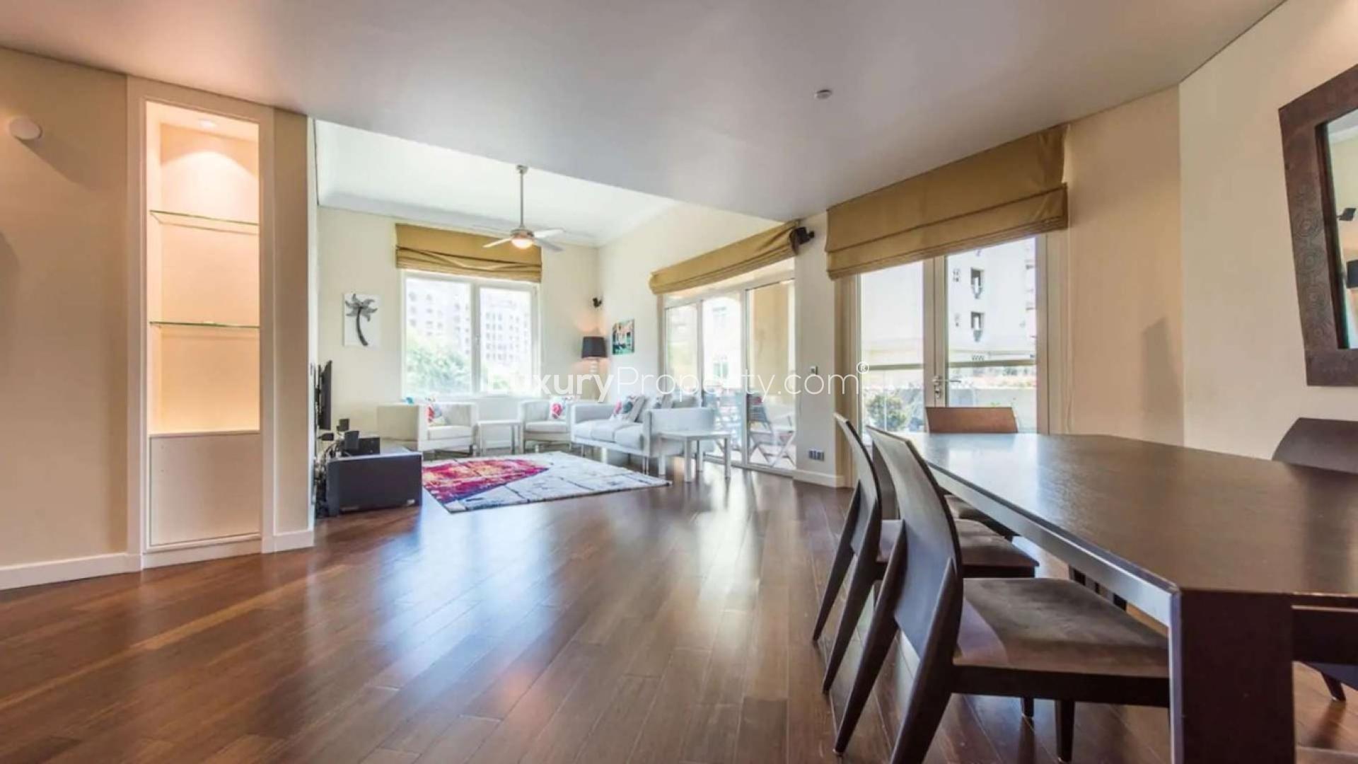 Upgraded bedroom in Shoreline Residences, Palm Jumeirah apartment, featuring mirrored wardrobes and decor