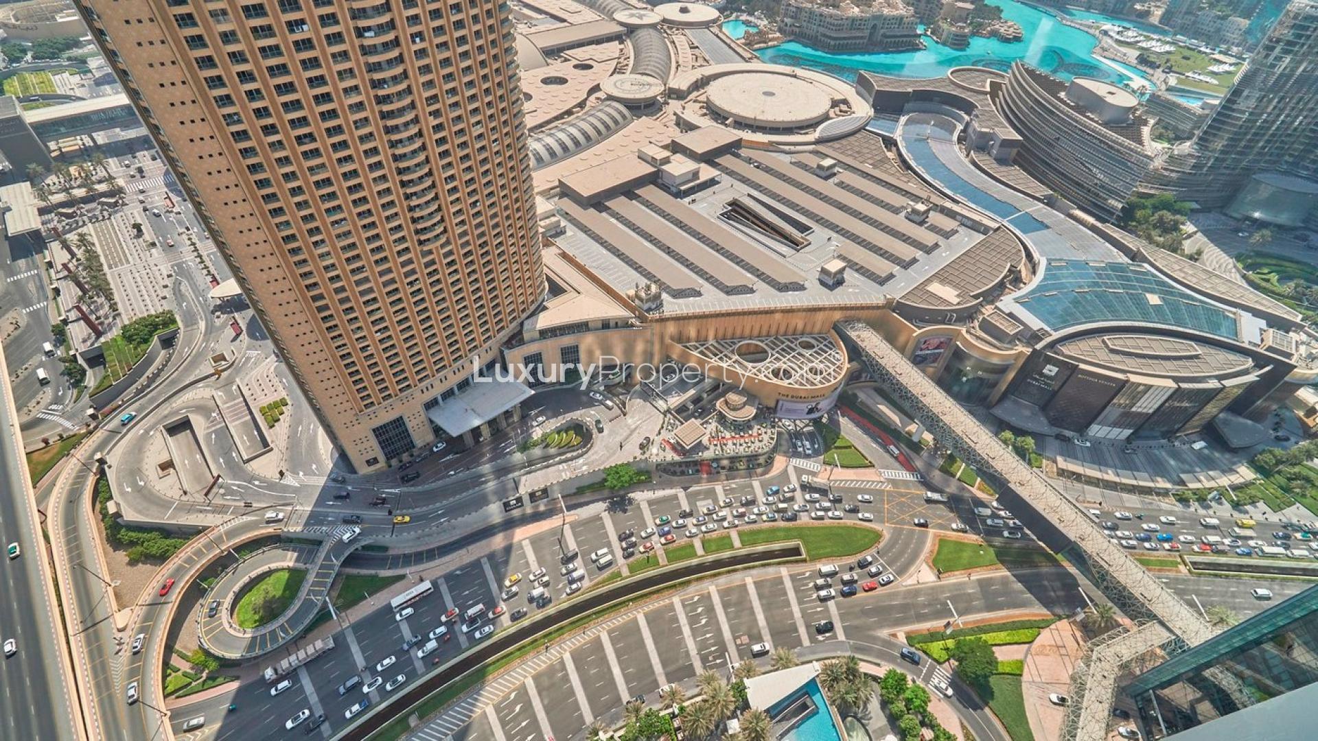 Luxurious living room in Downtown Dubai apartment, elegant furnishings, modern design, spacious layout