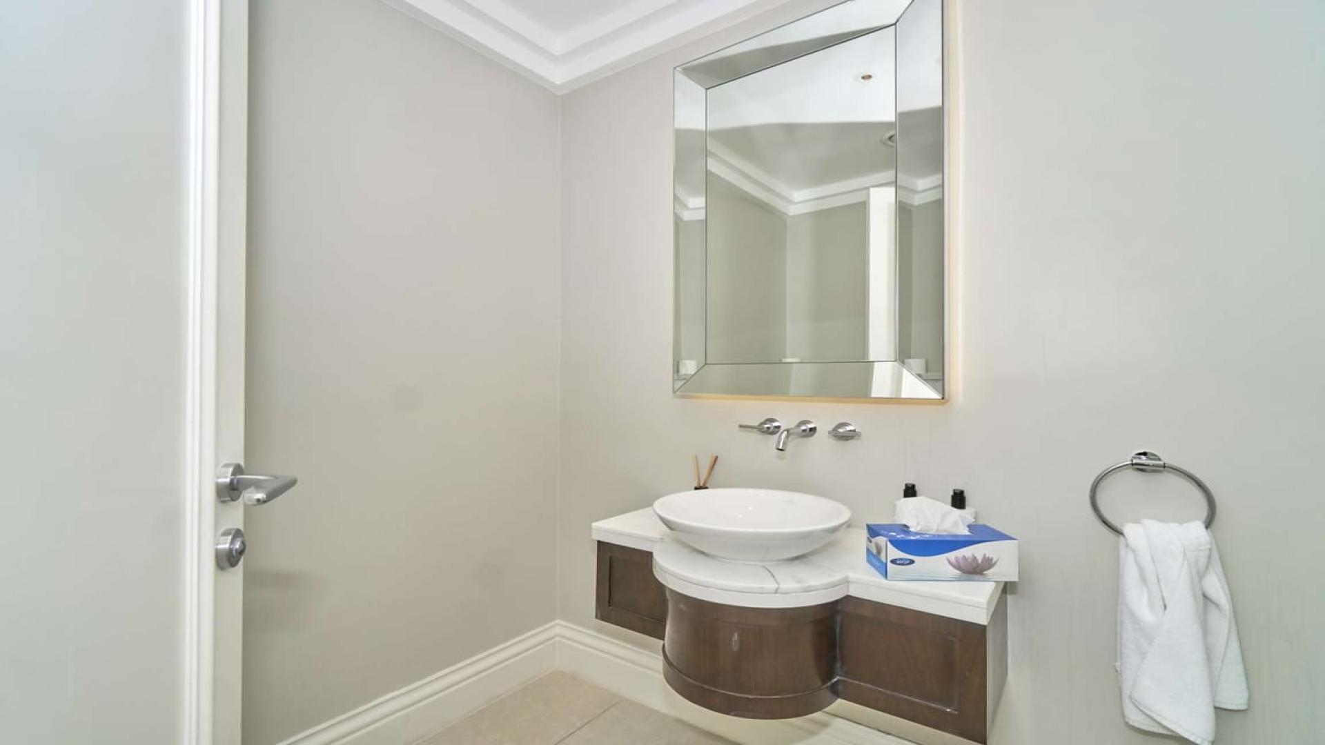 Luxurious living room in Downtown Dubai apartment with stunning city view, The Address The BLVD