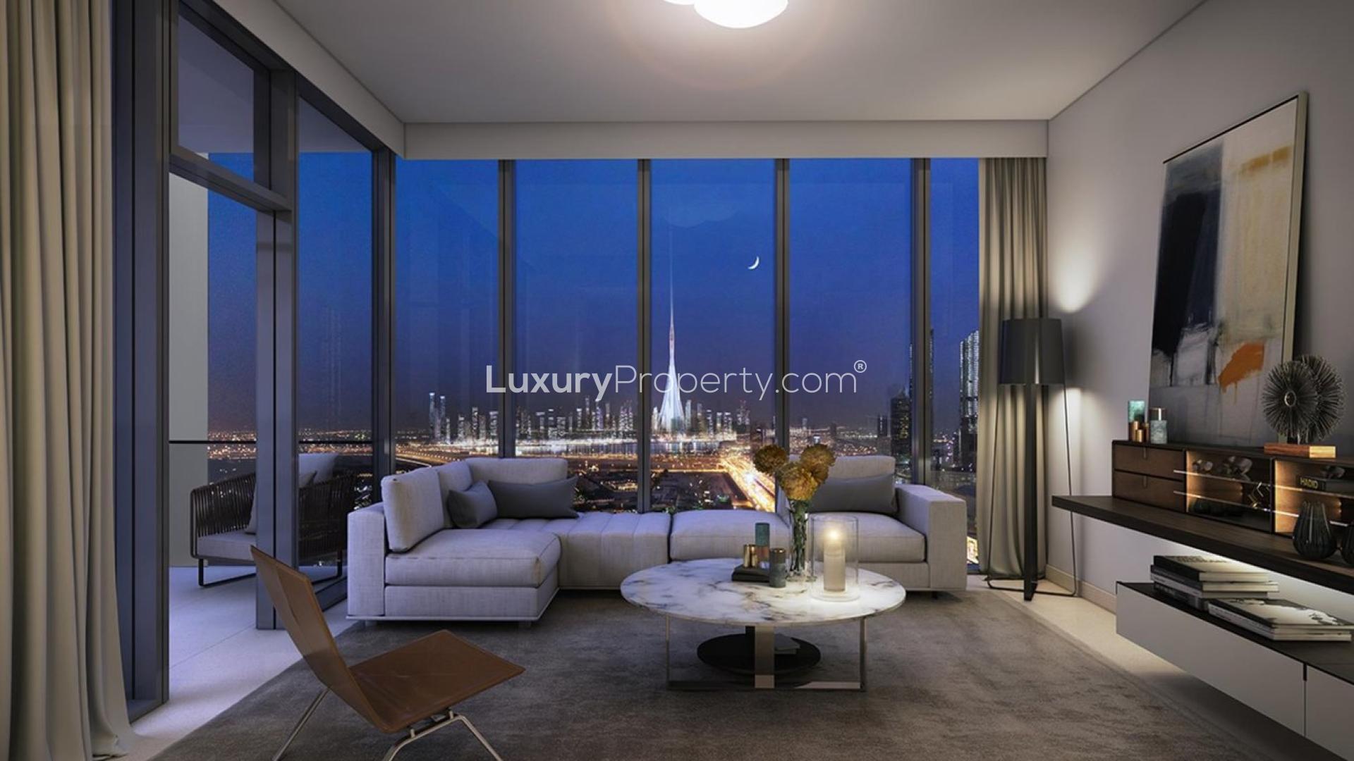 Modern Downtown Dubai apartment living room with city skyline views at night