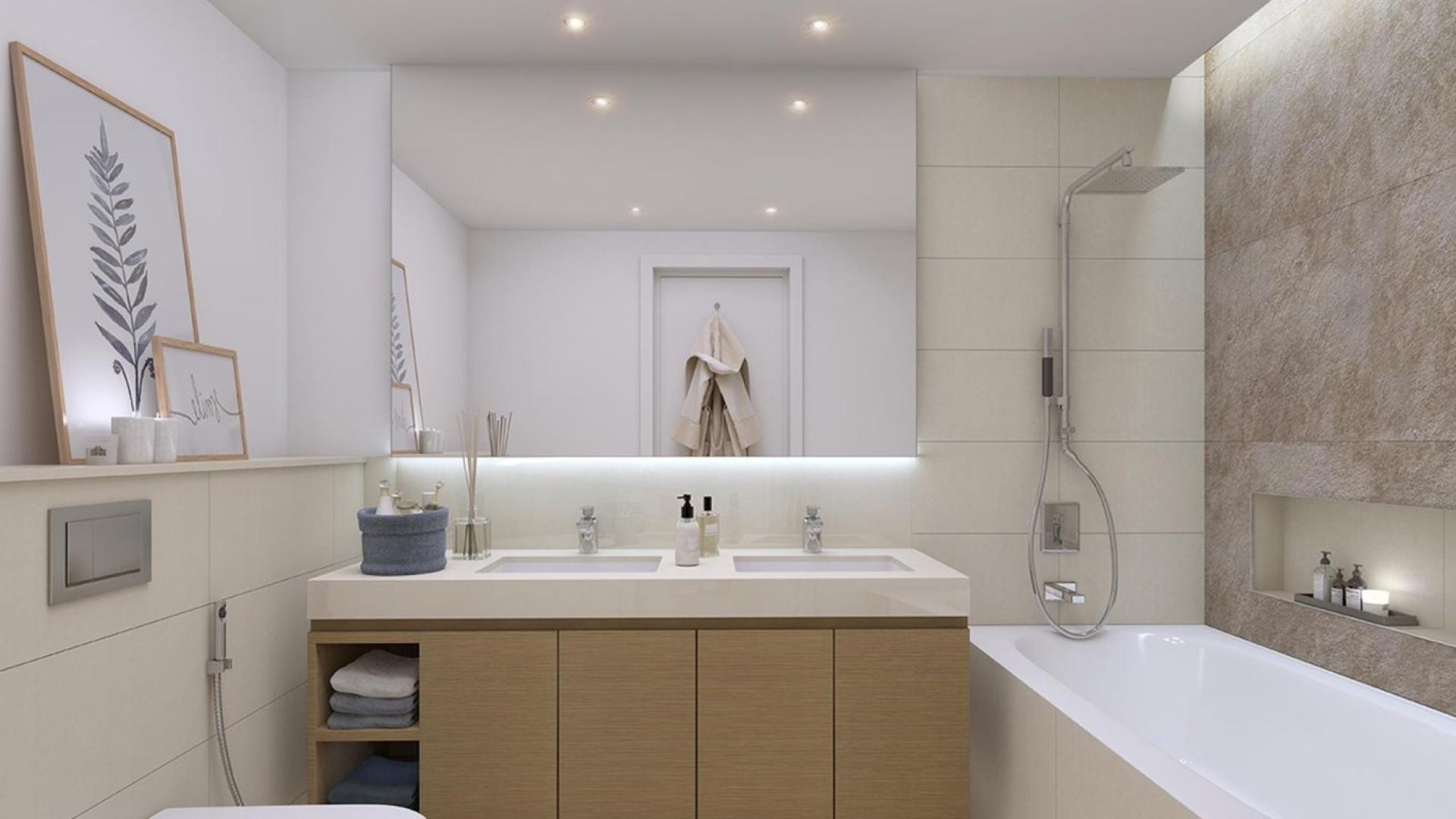 Luxurious Downtown Dubai apartment bedroom with city skyline view, modern decor, and balcony access