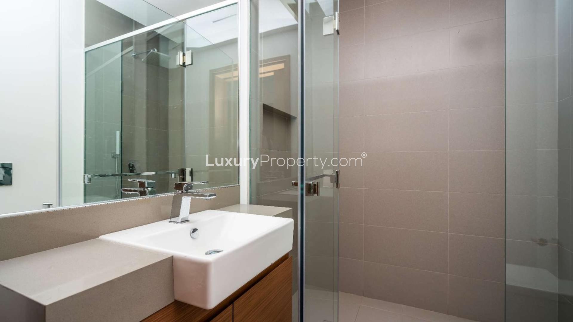 Spacious living area with large windows in City Walk, Jumeirah's 1-bedroom apartment for sale