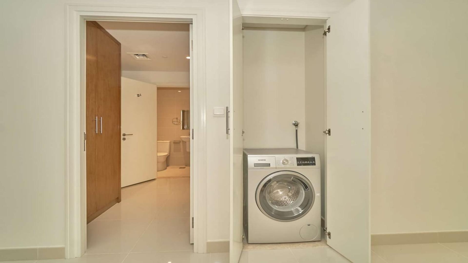 Spacious living area in three-bedroom apartment, BLVD Crescent, Downtown Dubai, for sale