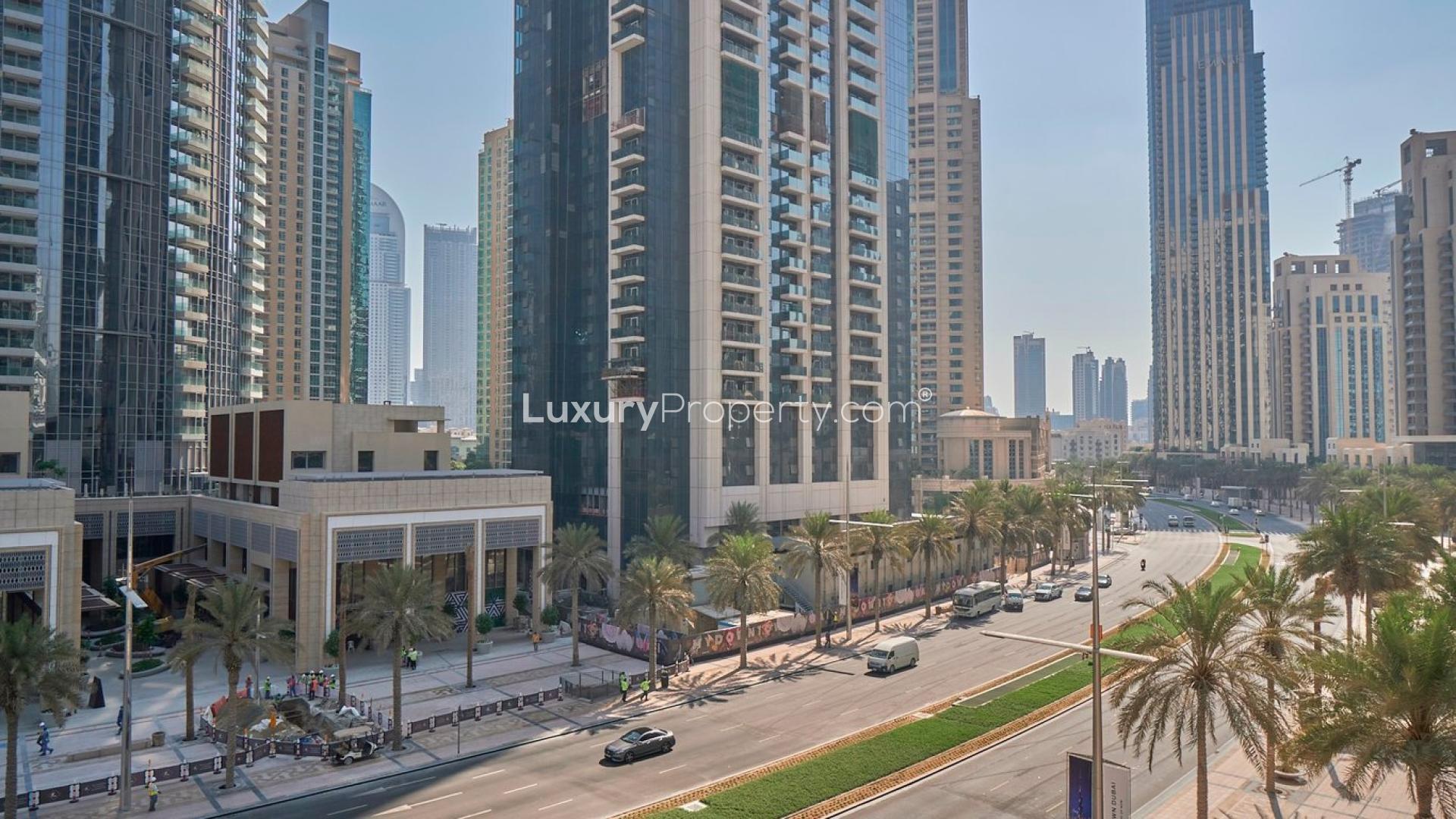 "Podium-level balcony view from three-bed duplex at BLVD Heights, Downtown Dubai.",N/A,Balcony view from three-bed duplex at BLVD Heights, Downtown Dubai, showcasing city skyline