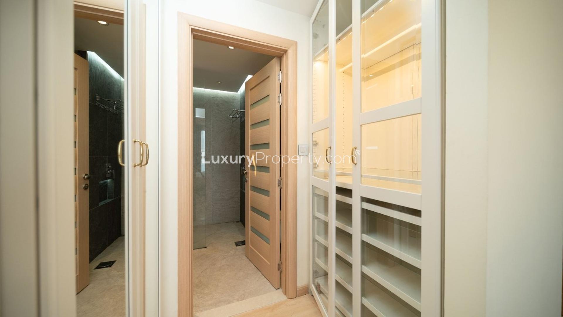 Modern JBR apartment living area with stylish kitchen and sea view in Amwaj