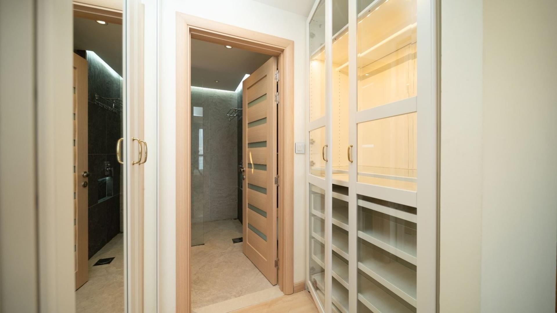 Modern JBR apartment living area with stylish kitchen and sea view in Amwaj