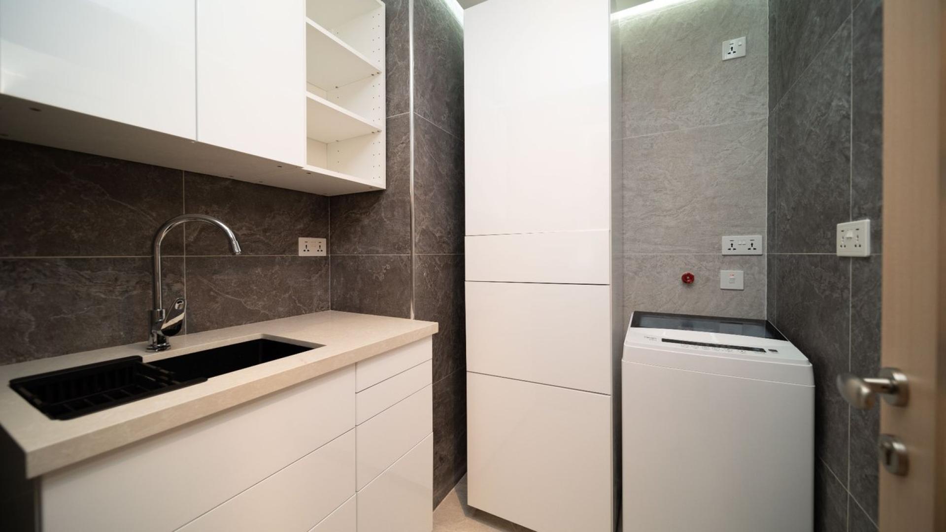 Luxurious JBR apartment bedroom with sea view, modern decor, and stylish furnishings