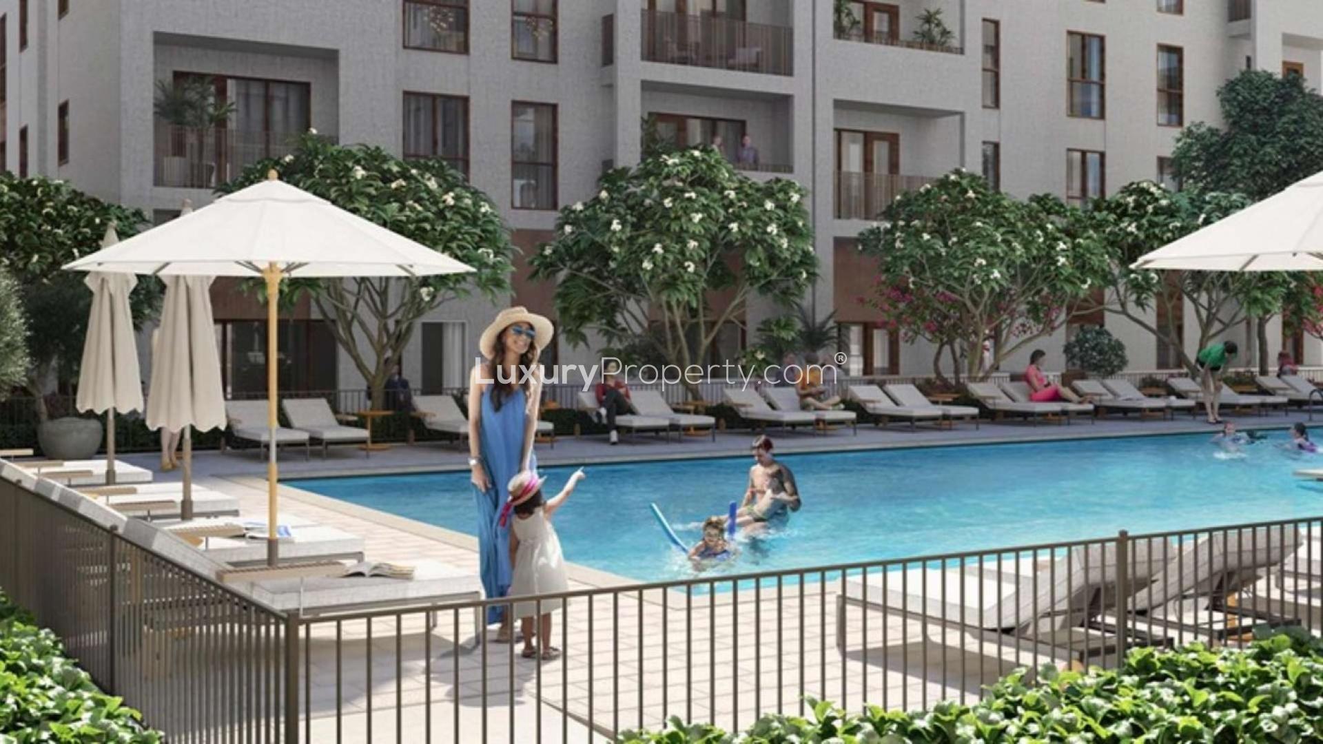 High-floor 3-bedroom apartment exterior, Dubai Creek Harbour, Creek Beach, surrounded by lush landscaping