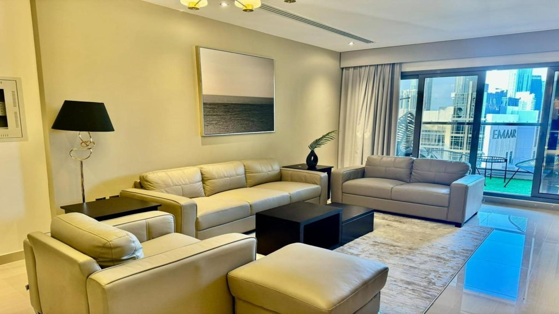 Balcony with seating and stunning Burj Khalifa views in Downtown Dubai apartment for sale