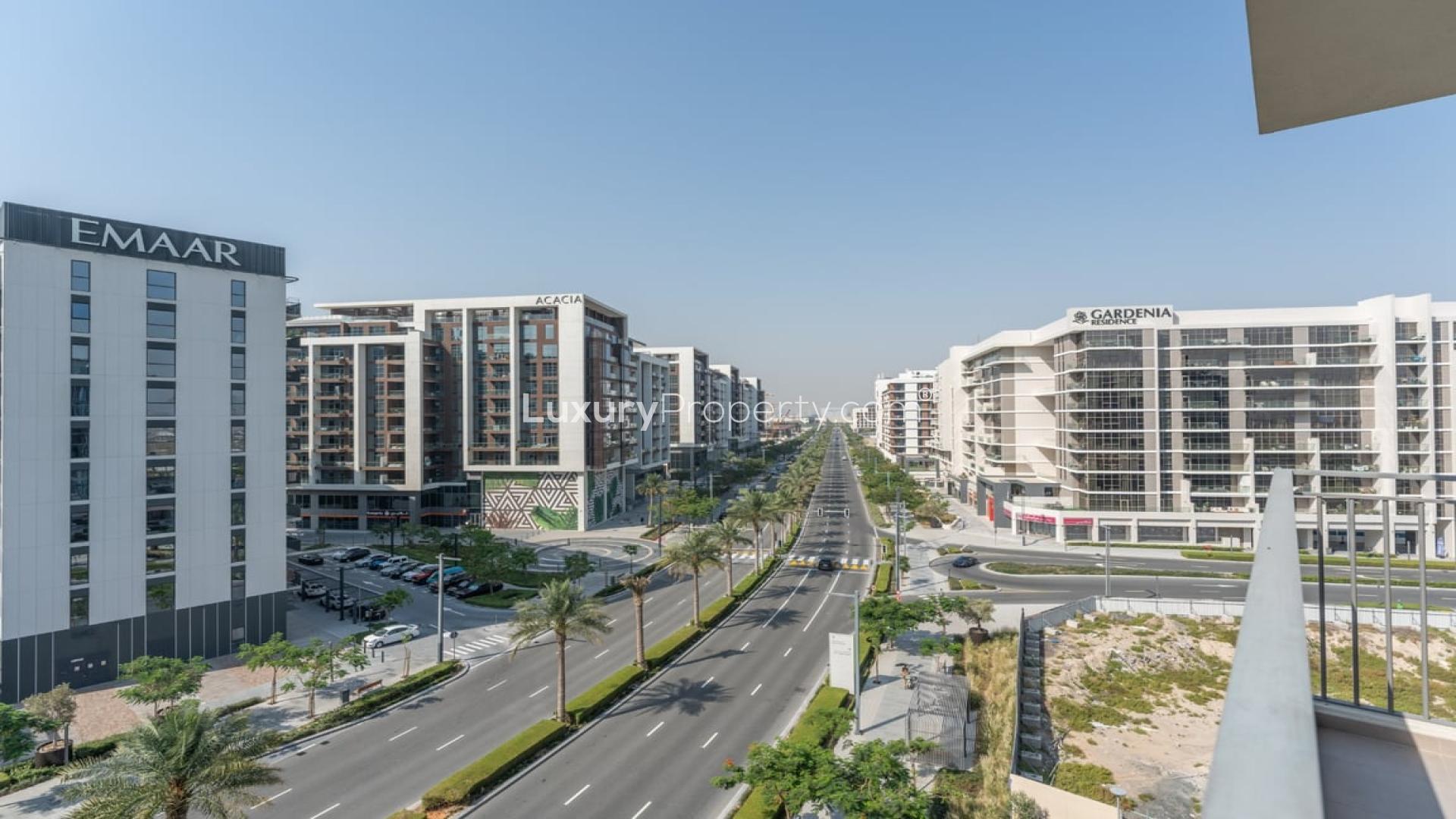 Spacious living room with large windows in Dubai Hills Estate apartment for sale