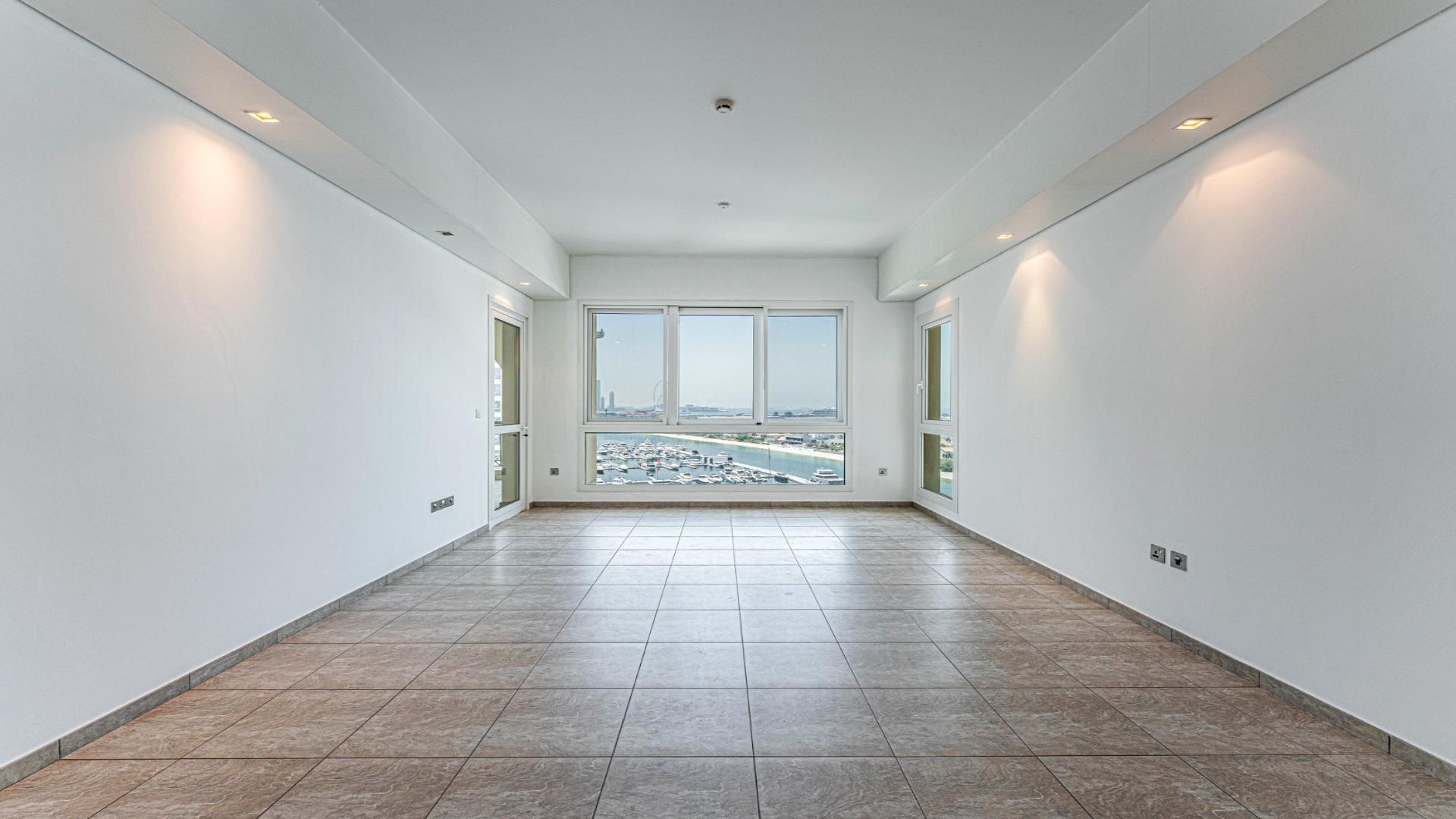 Empty high-floor apartment interior in Marina Residences, Palm Jumeirah, Dubai, for sale