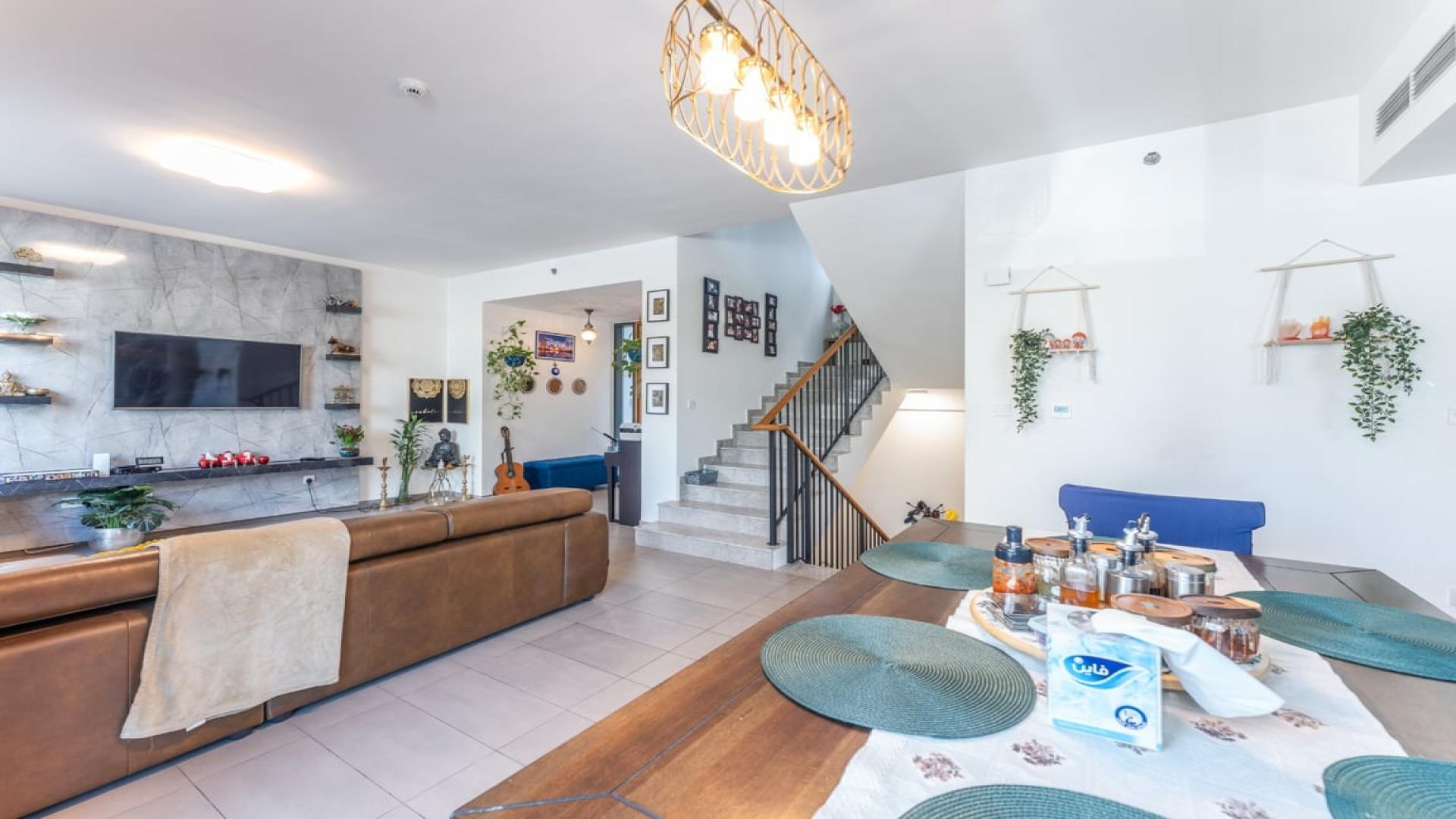 Elegant living area in 3-bedroom townhouse, Executive Residences, Dubai Hills Estate. Modern interior design