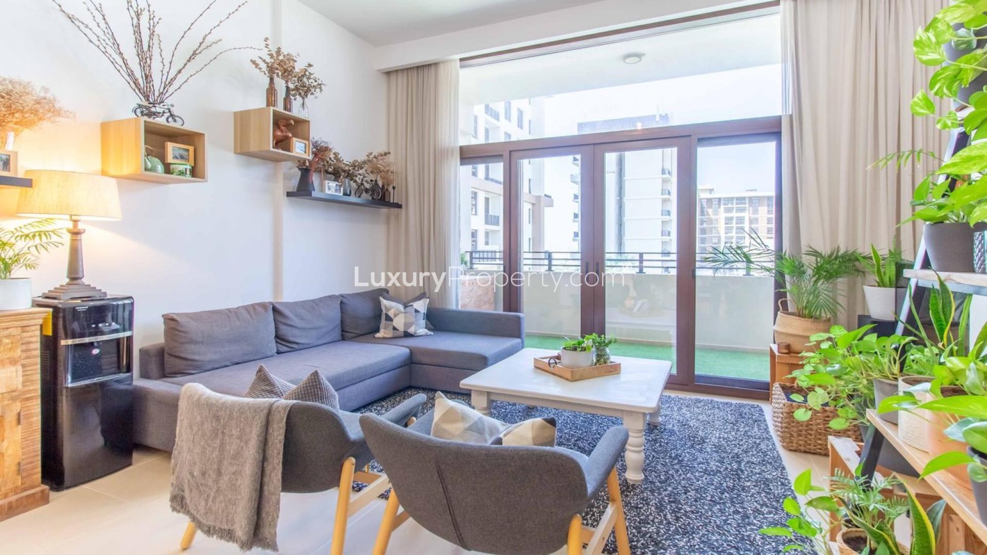 Luxurious living room in 3-bedroom apartment, Warda, Town Square Dubai, with modern decor