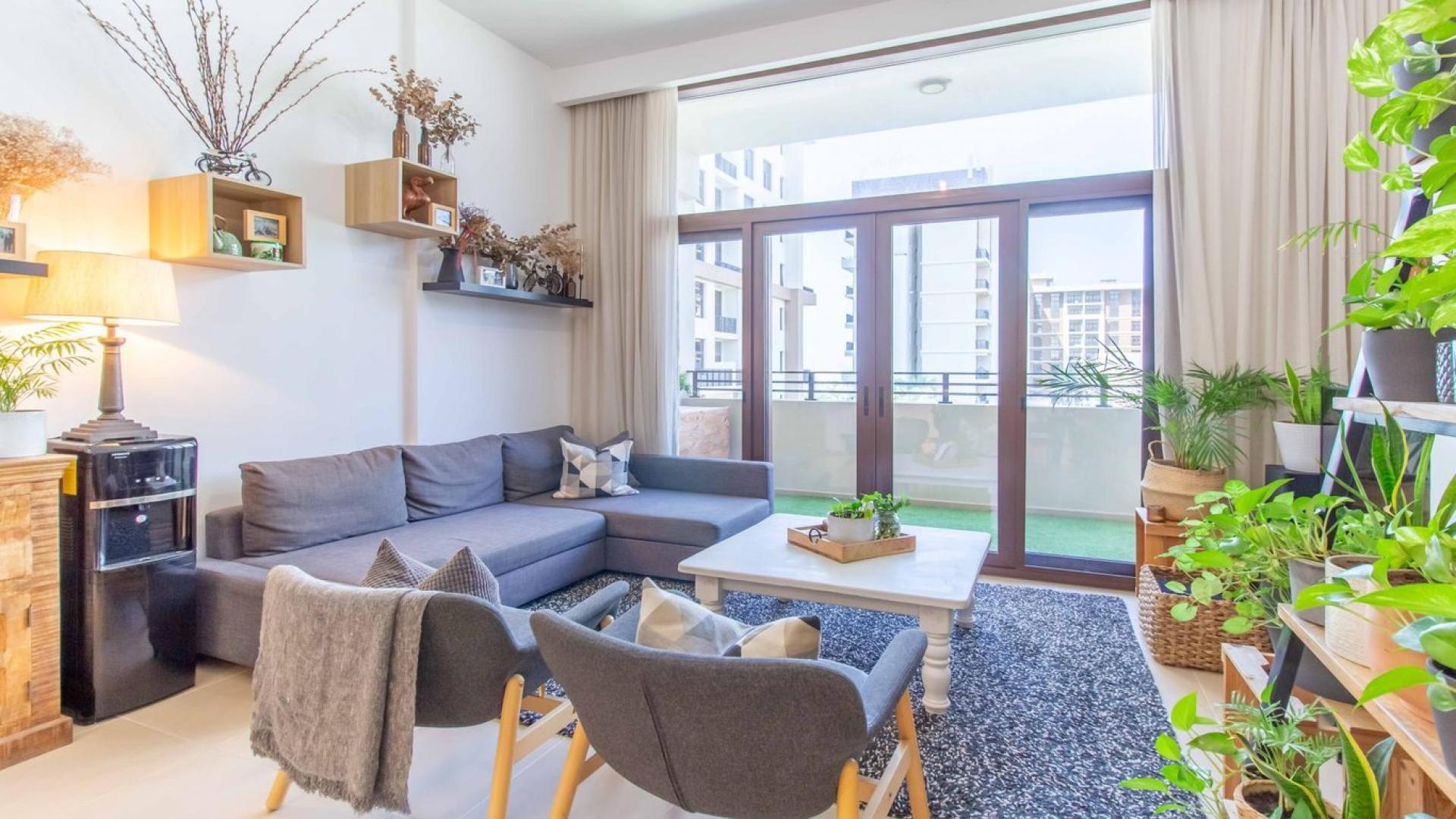 Luxurious living room in 3-bedroom apartment, Warda, Town Square Dubai, with modern decor