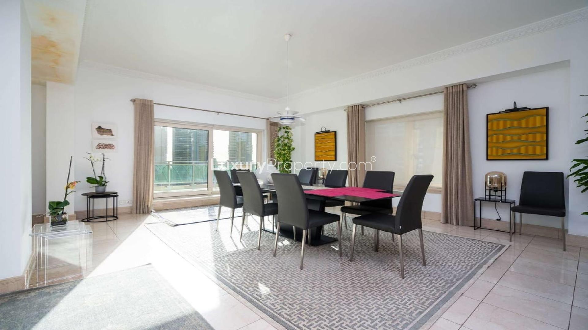 Luxurious dining area in 3-bedroom penthouse, Fairooz Tower, Dubai Marina, full marina views