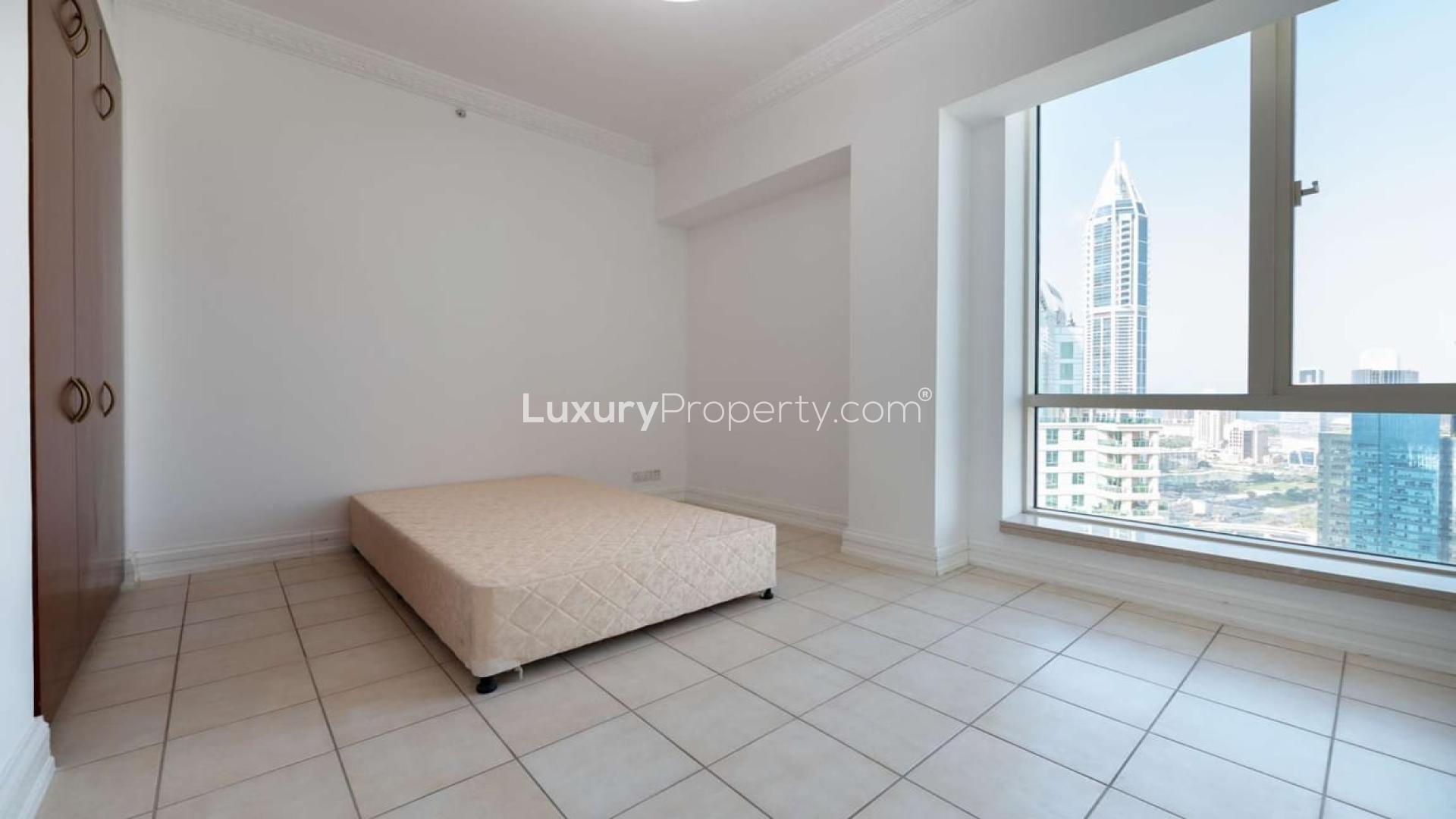 "Spacious terrace with stunning city views in Dubai Marina luxury duplex penthouse for rent.","Spacious bedroom with city view in luxury duplex penthouse, Dubai Marina, Emaar 6 Towers.",Skyline view from luxury duplex penthouse in Emaar 6 Towers, Dubai Marina