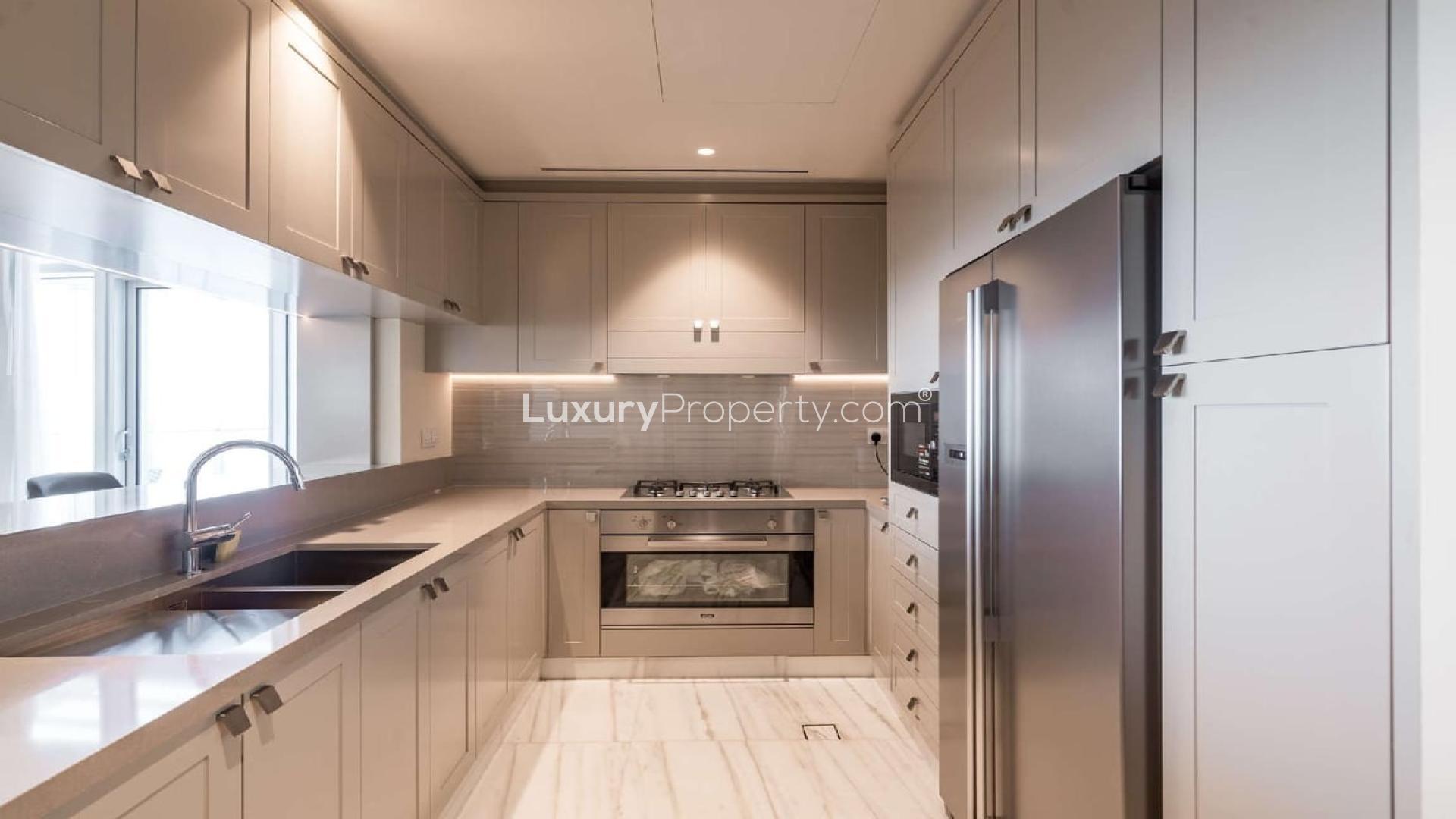 Luxurious living and dining area in Downtown Dubai penthouse with city views