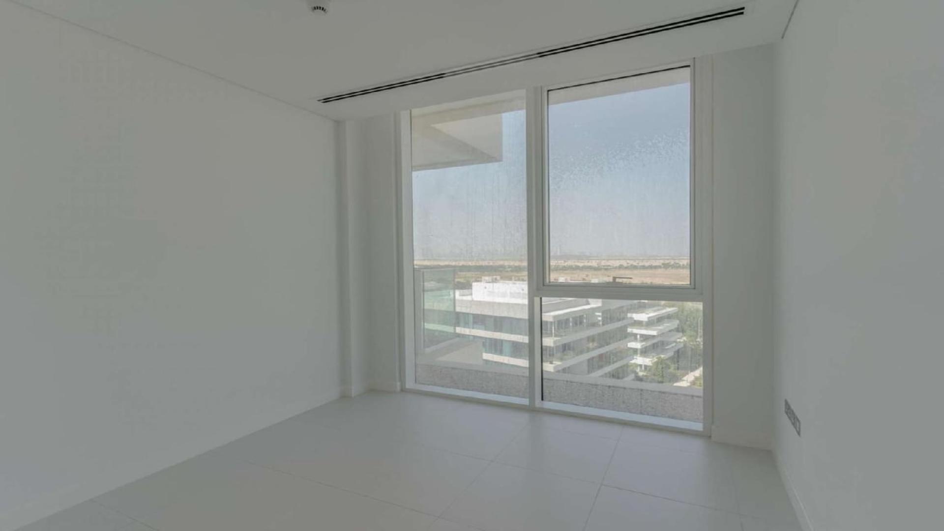 Modern duplex penthouse exterior in Al Barari's Seventh Heaven, Dubai, surrounded by greenery