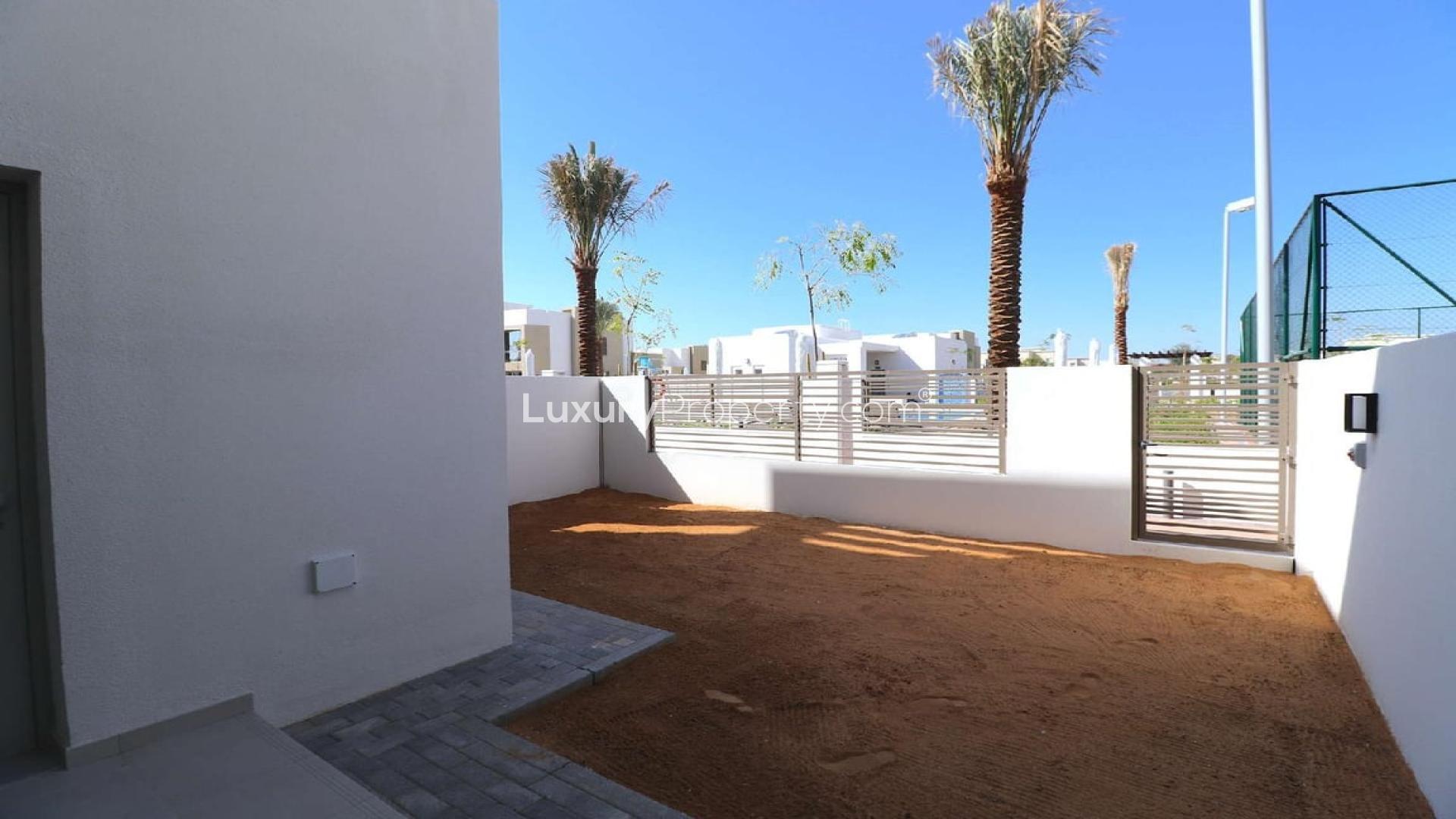 Modern 3-bedroom townhouse exterior in Reem, Arabian Ranches 2, Dubai for rent