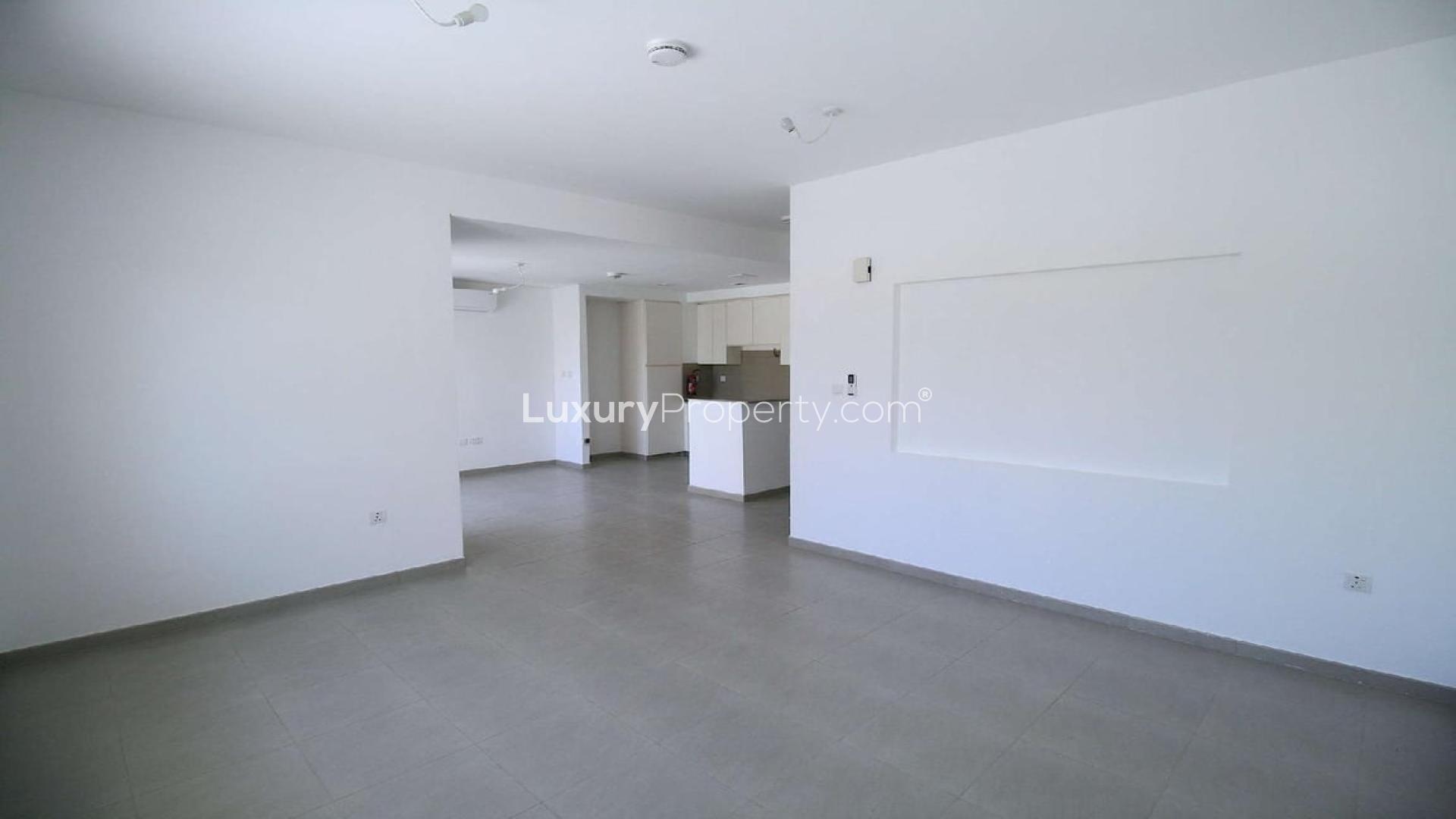 Open-plan living area in 3-bedroom townhouse for rent, Zahra Townhouses, Town Square