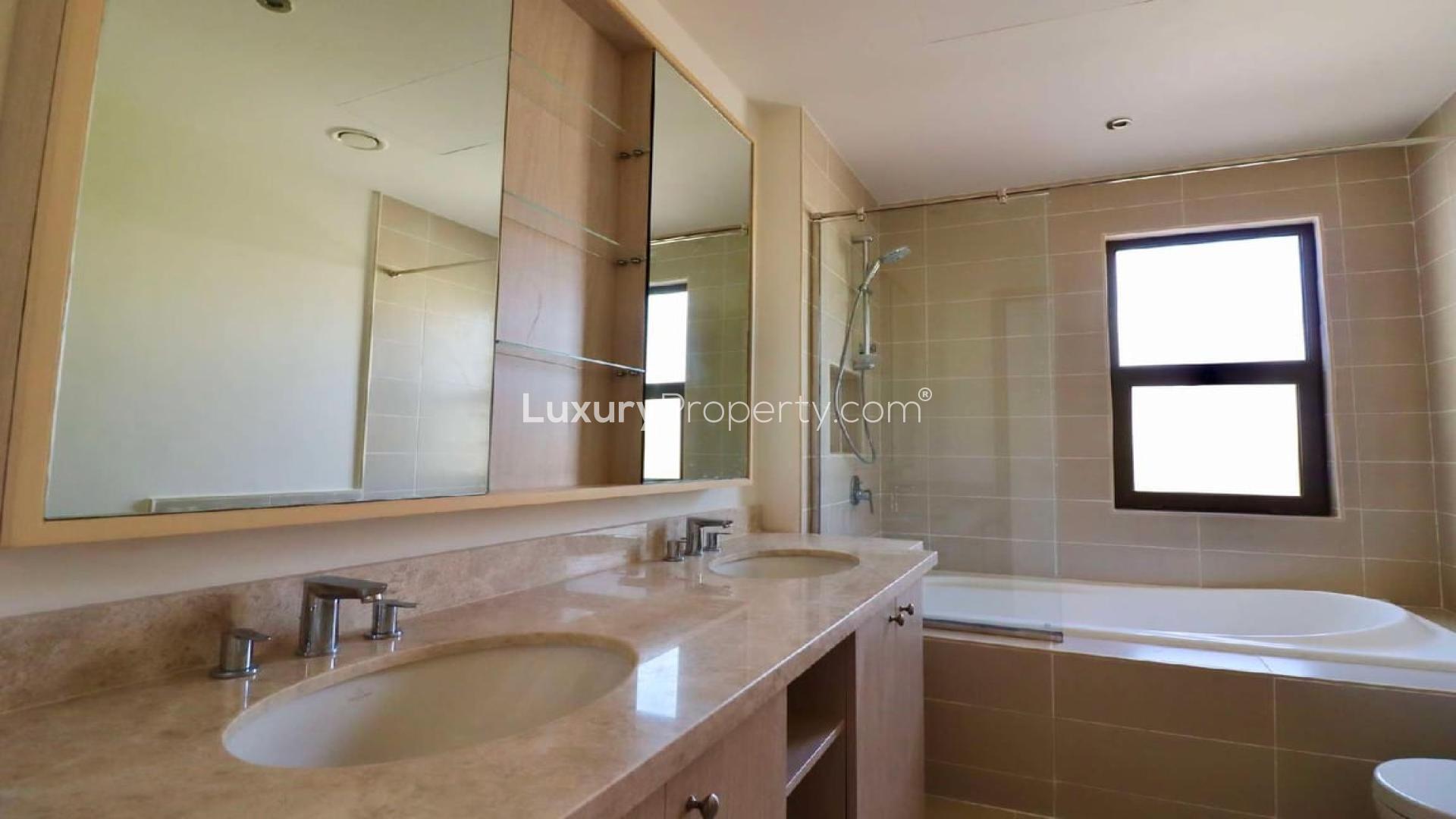 Single row townhouse view with lush greenery in Mira Oasis 3, Reem community