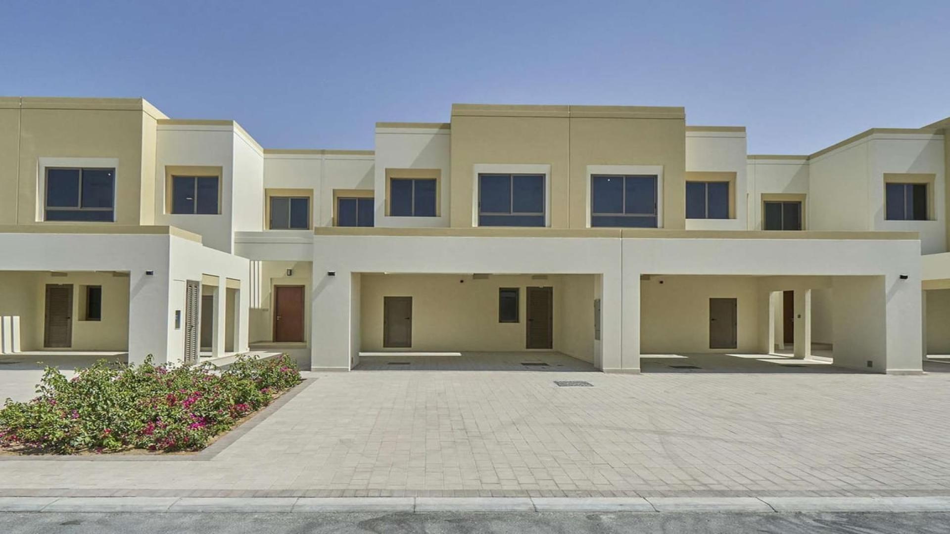 Brand new 3-bedroom townhouse exterior in Naseem, Town Square, desert view