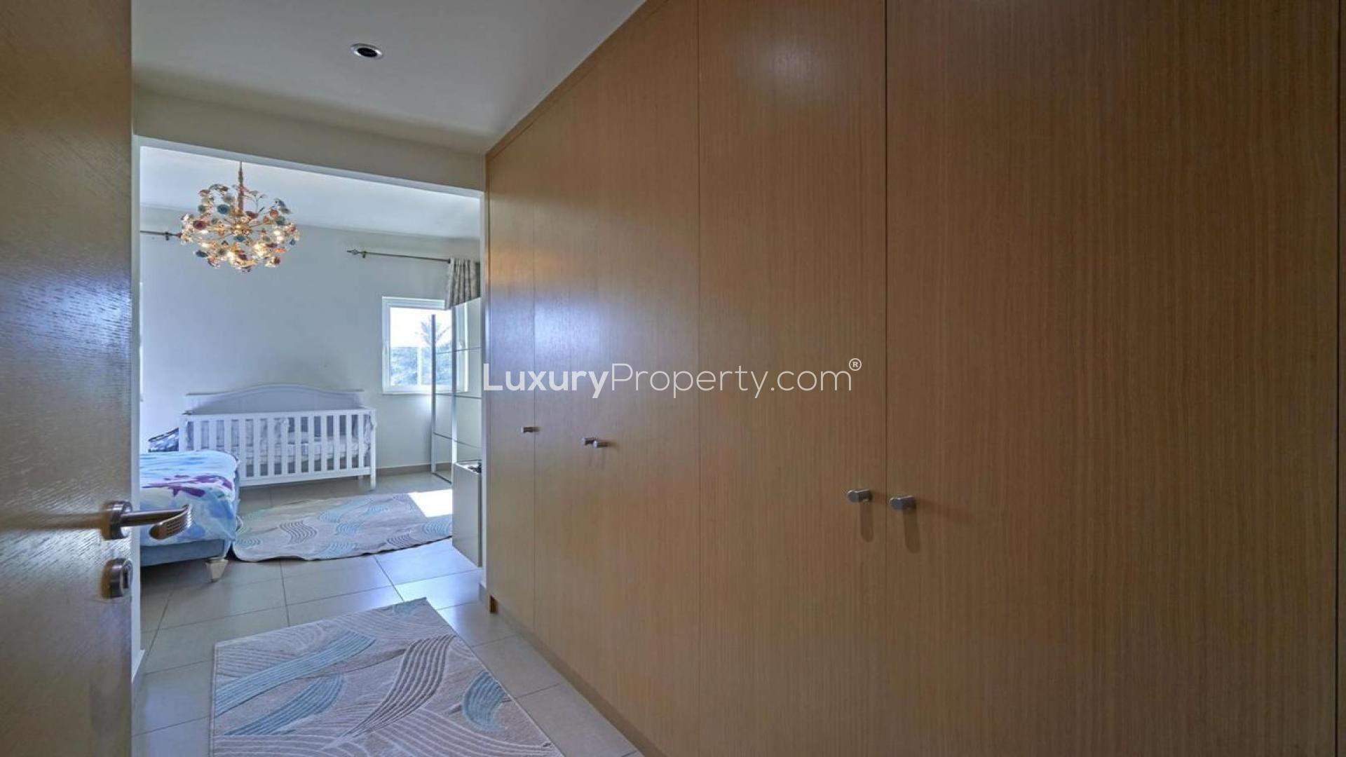 Elegant hallway in Quortaj-style townhouse, Al Furjan, featuring modern staircase and decor