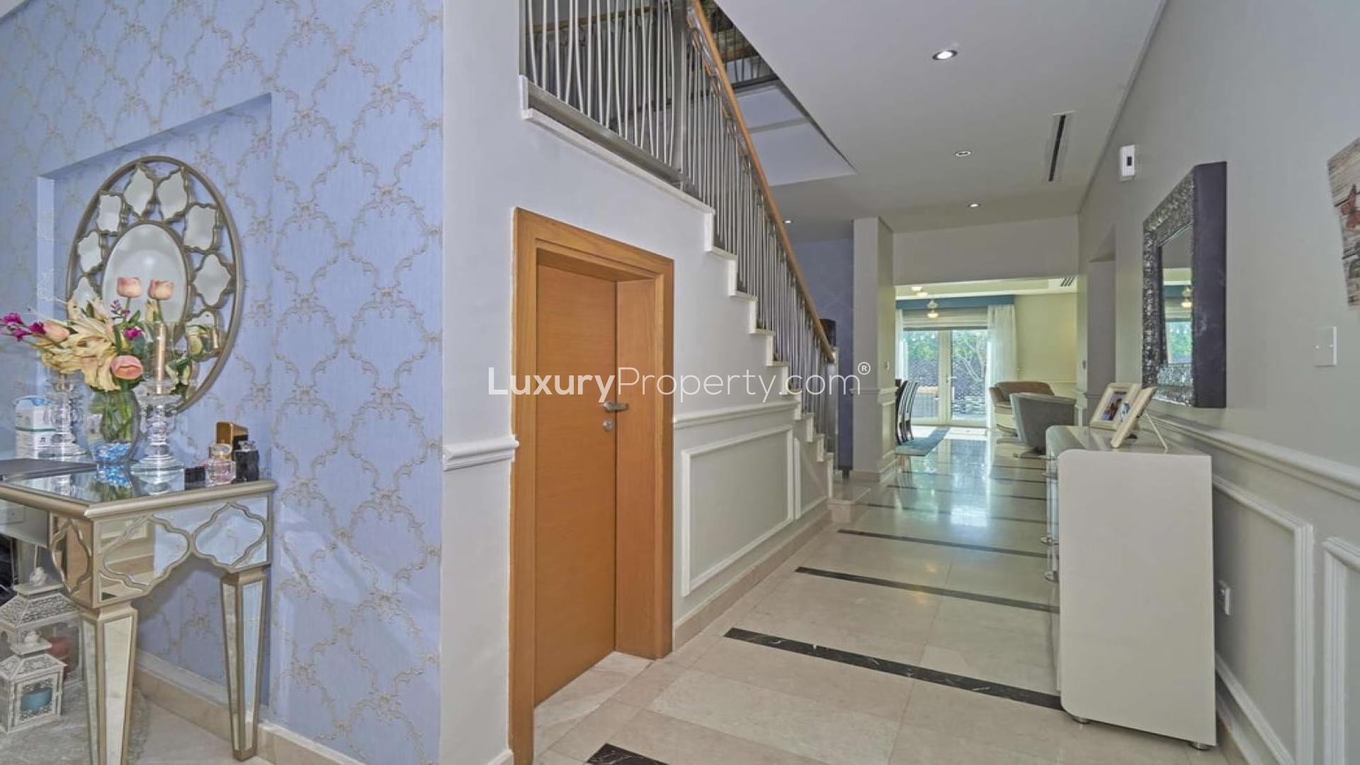 N/A,Elegant foyer in three-bedroom townhouse, Al Furjan North Village, featuring stylish decor and staircase