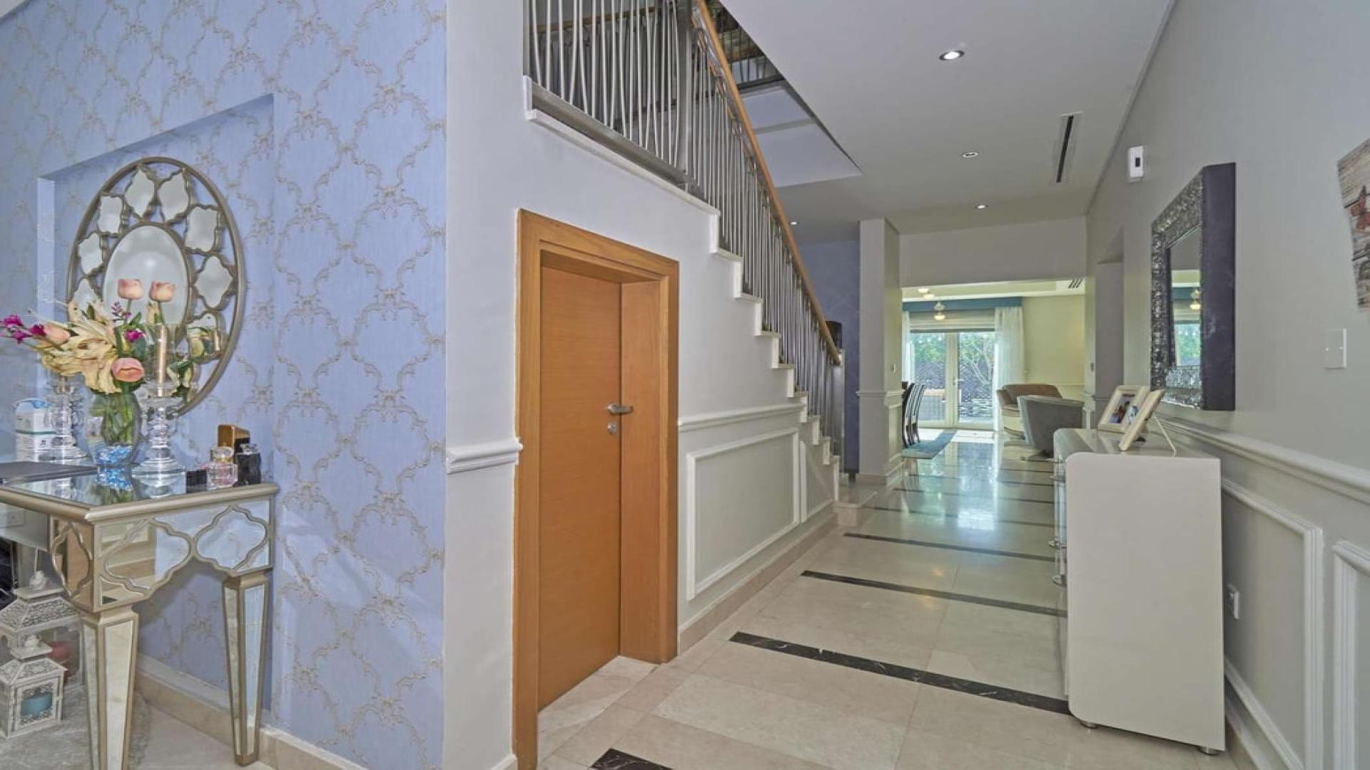 N/A,Elegant foyer in three-bedroom townhouse, Al Furjan North Village, featuring stylish decor and staircase