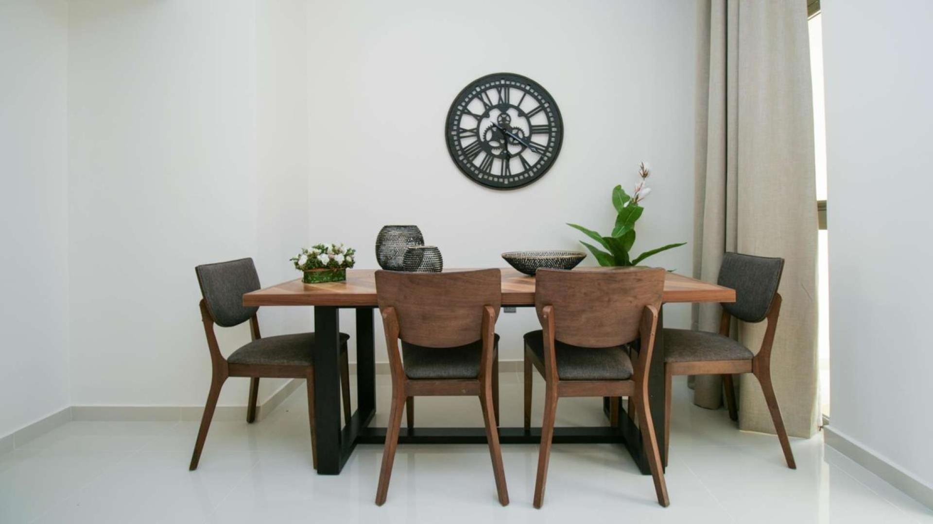 Stunning 3-bedroom townhouse exterior in Zinnia, Damac Hills 2, available for rent