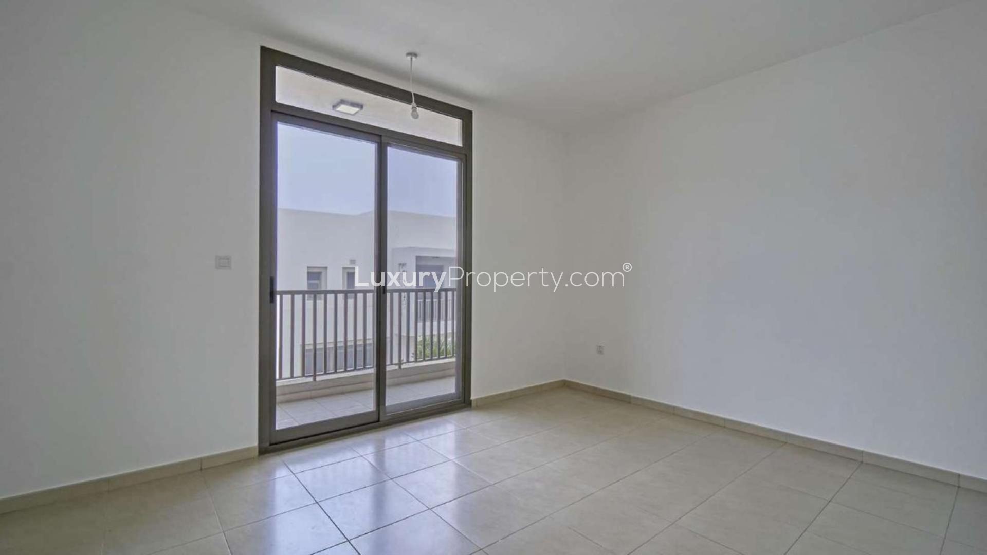 Modern kitchen and staircase in three-bedroom townhouse, Hayat Townhouses, Town Square, Dubai