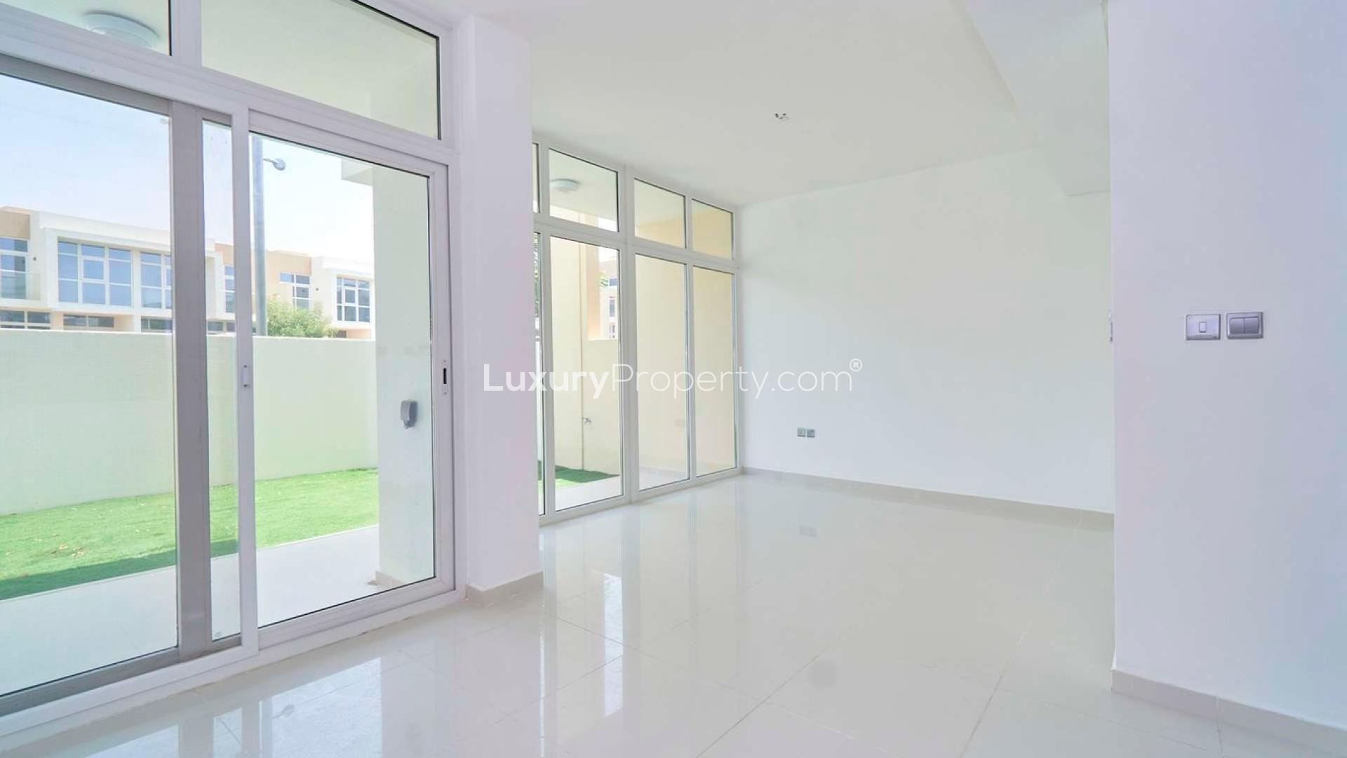 Immaculate living area with large windows in 3-bedroom townhouse, Damac Hills 2, Avencia