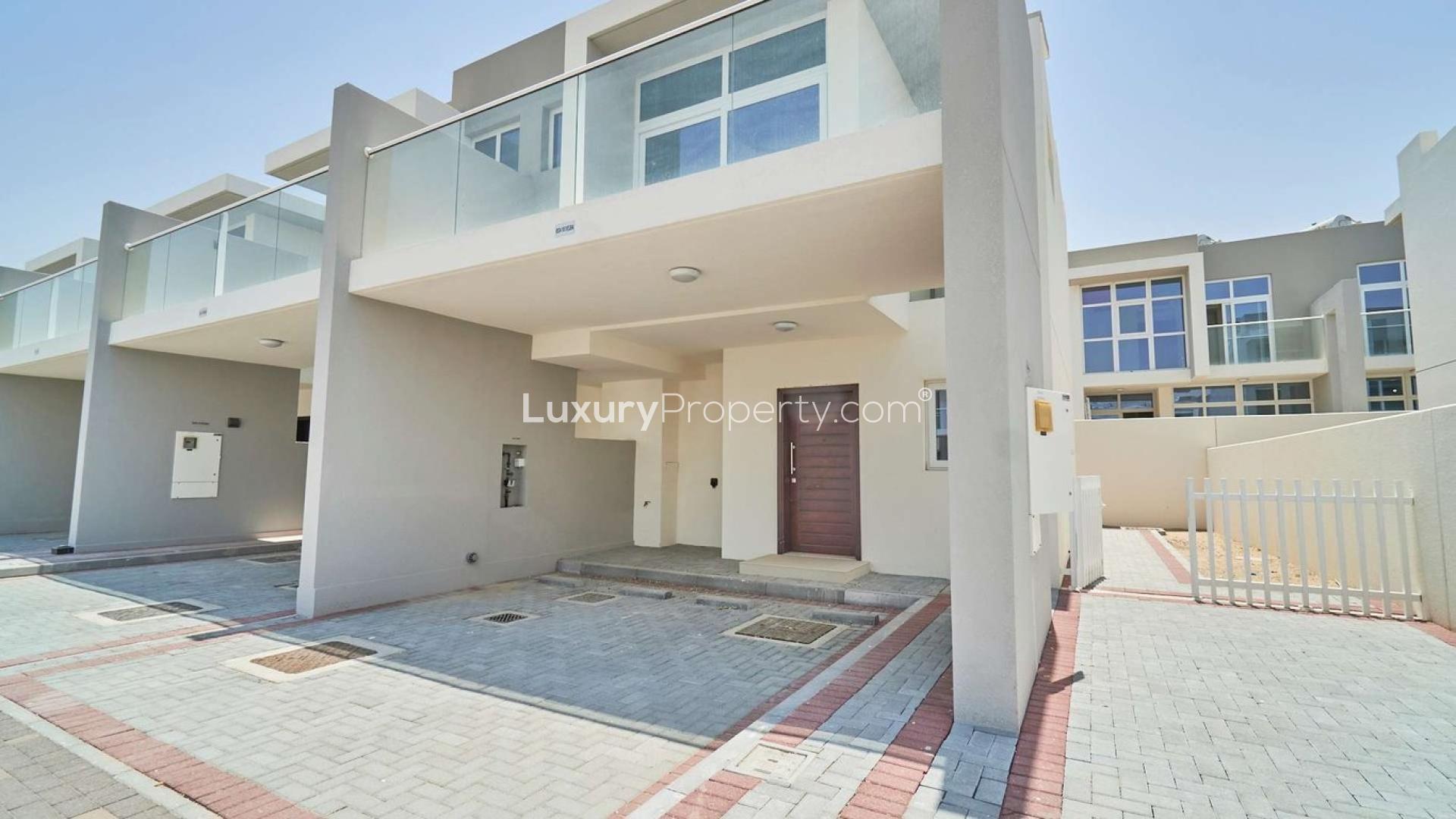 Modern 3-bedroom townhouse exterior in Albizia, Damac Hills 2, available for rent