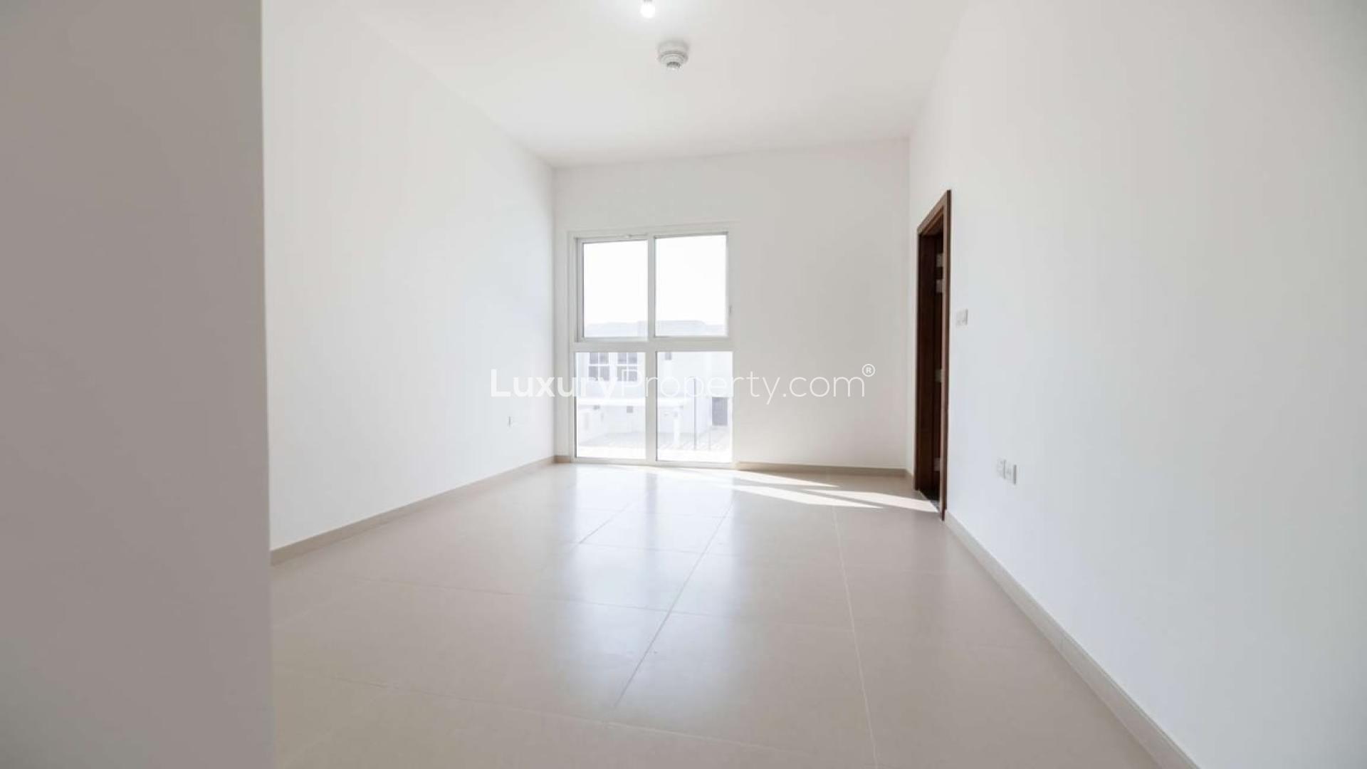 Modern kitchen and living area in 3-bed townhouse, Arabella 3, Mudon, Dubai