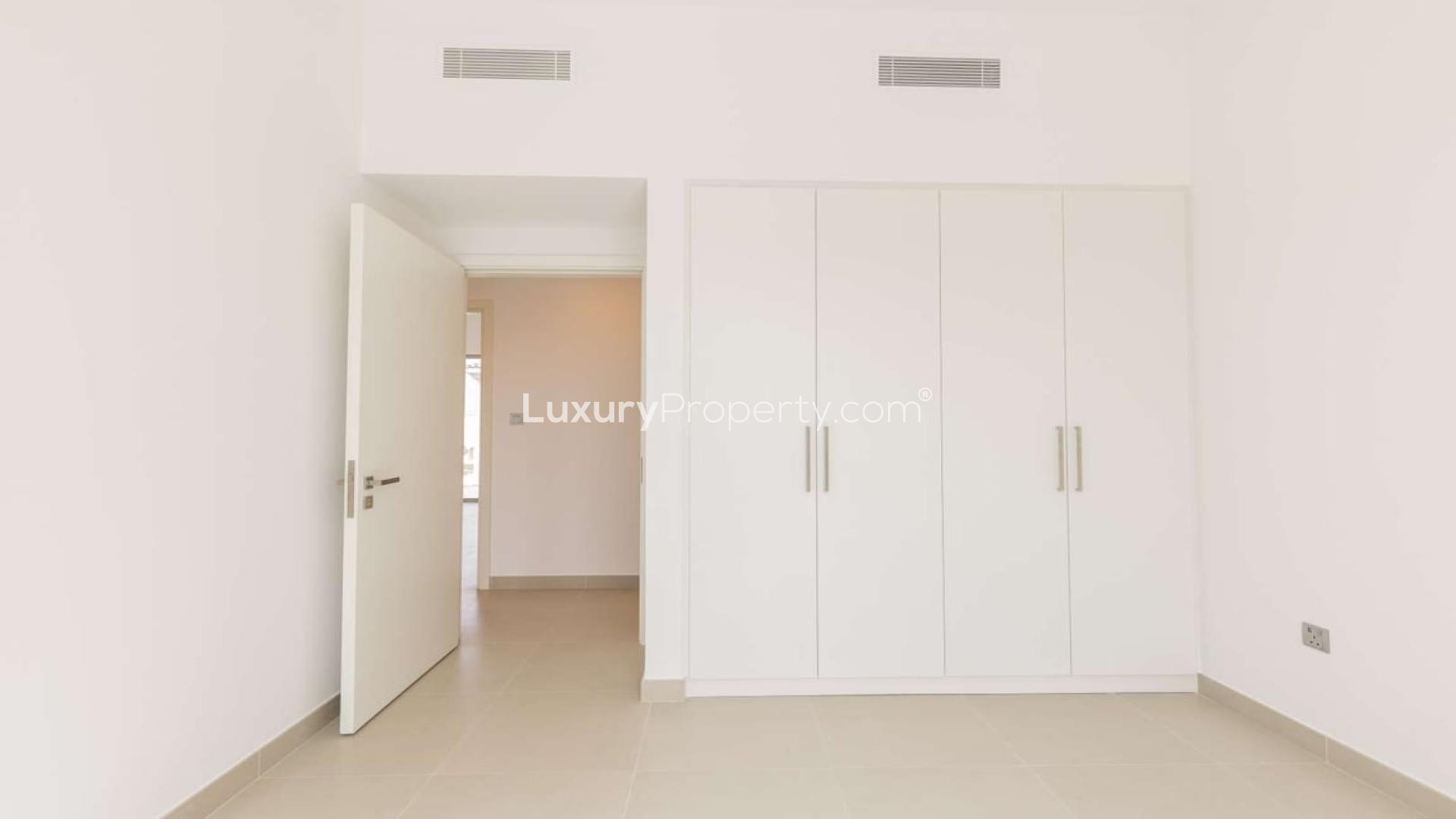 Brand new townhouse exterior with landscaped garden in Camelia, Arabian Ranches 2