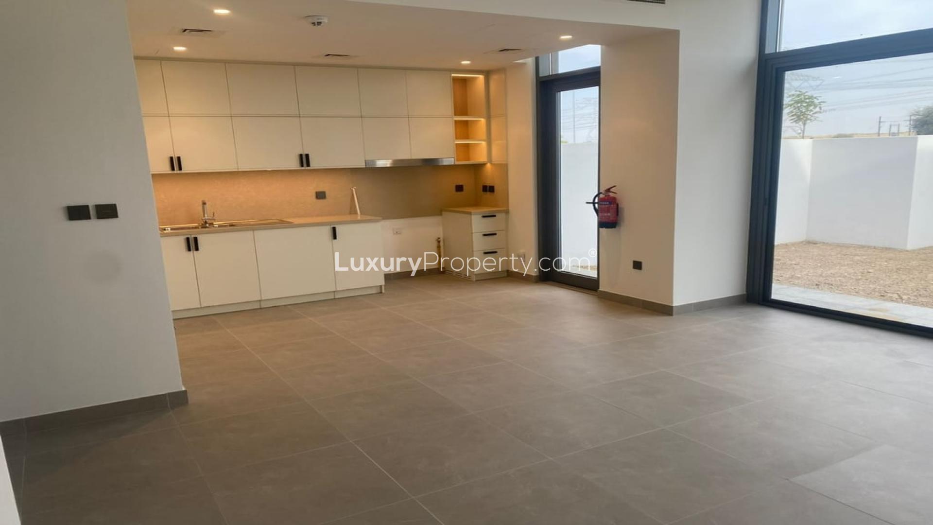 Outdoor pool area in Arabian Ranches 3 townhouse community, Ruba, available for rent