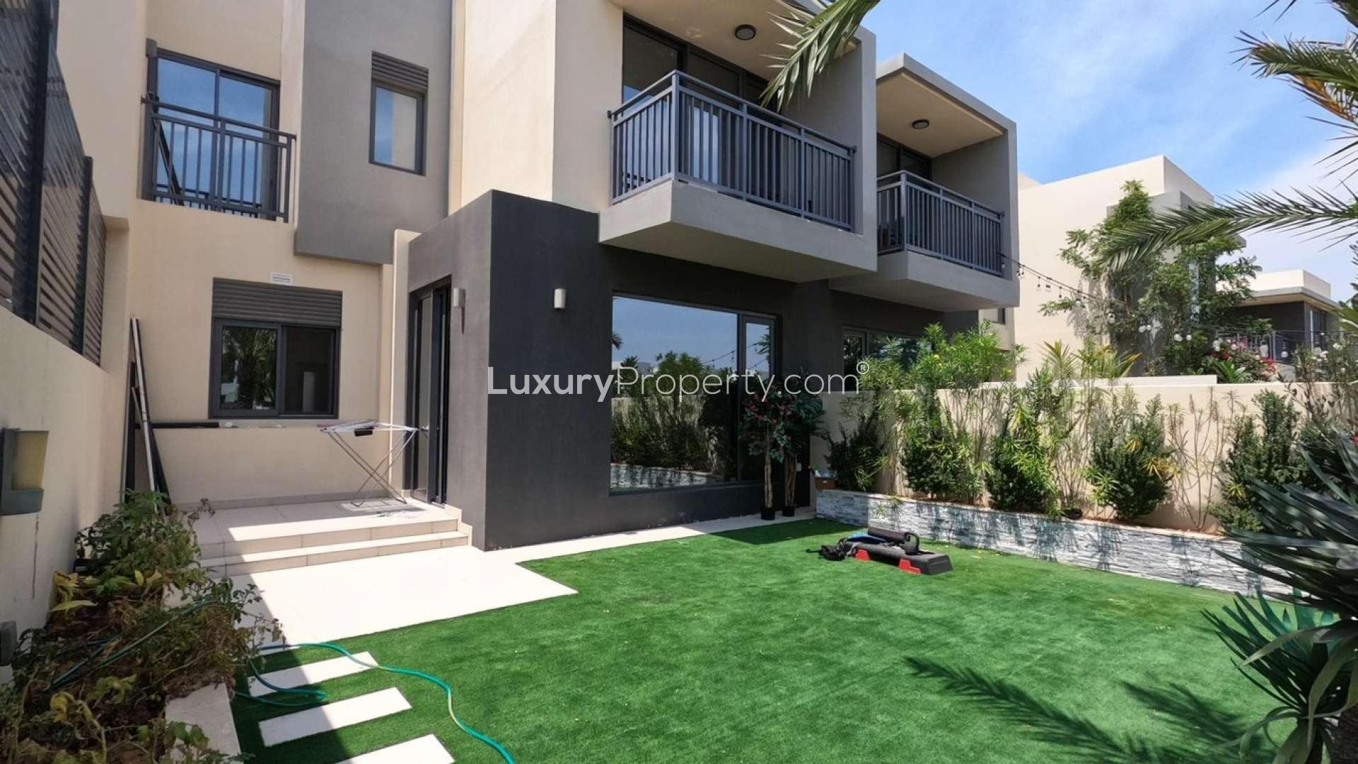 Modern interior of Maple Townhouse in Dubai Hills Estate with staircase and sliding doors